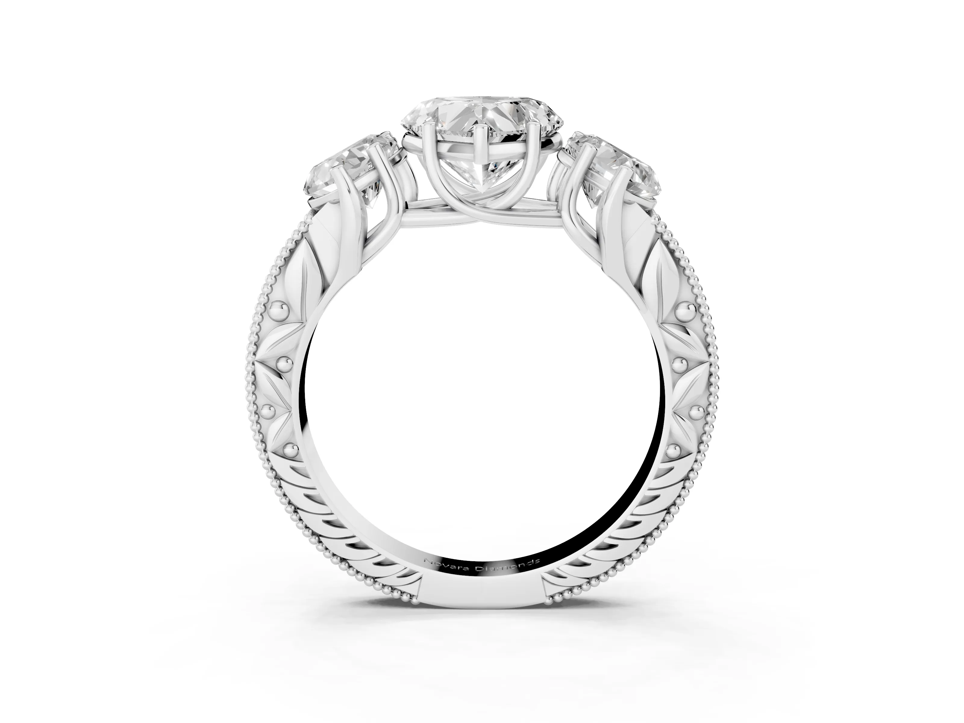 Heart Cut Diamond Three-Stone Engagement Ring Set in Platinum with Milgrain Pavé Band