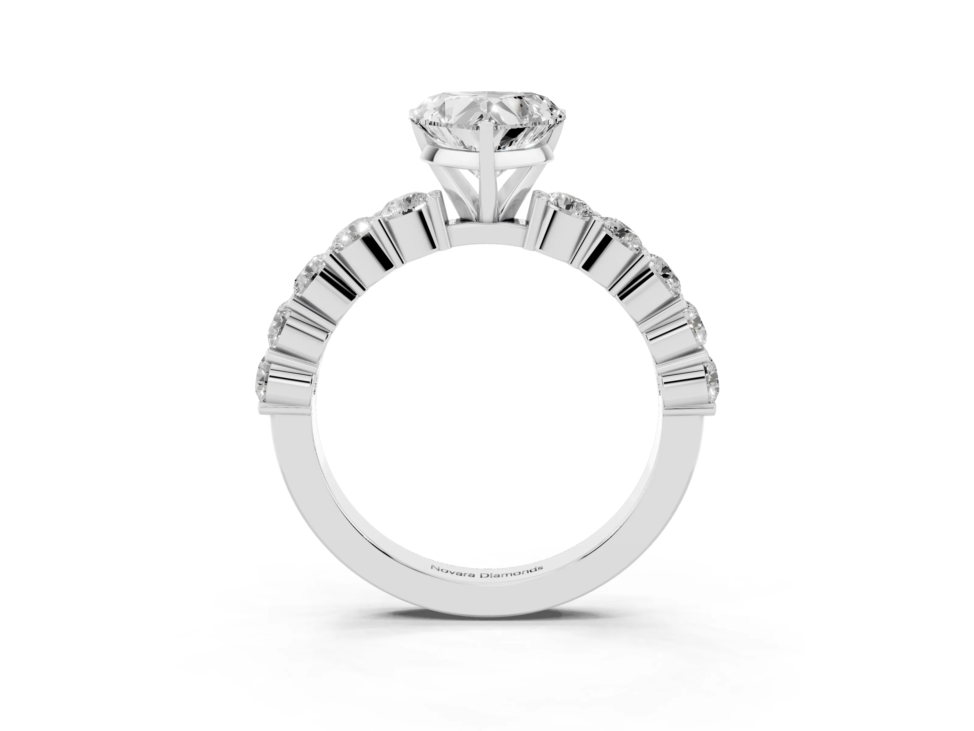 Heart Cut Diamond Solitaire Ring Set in White gold with Shared Prong Round Side Stones