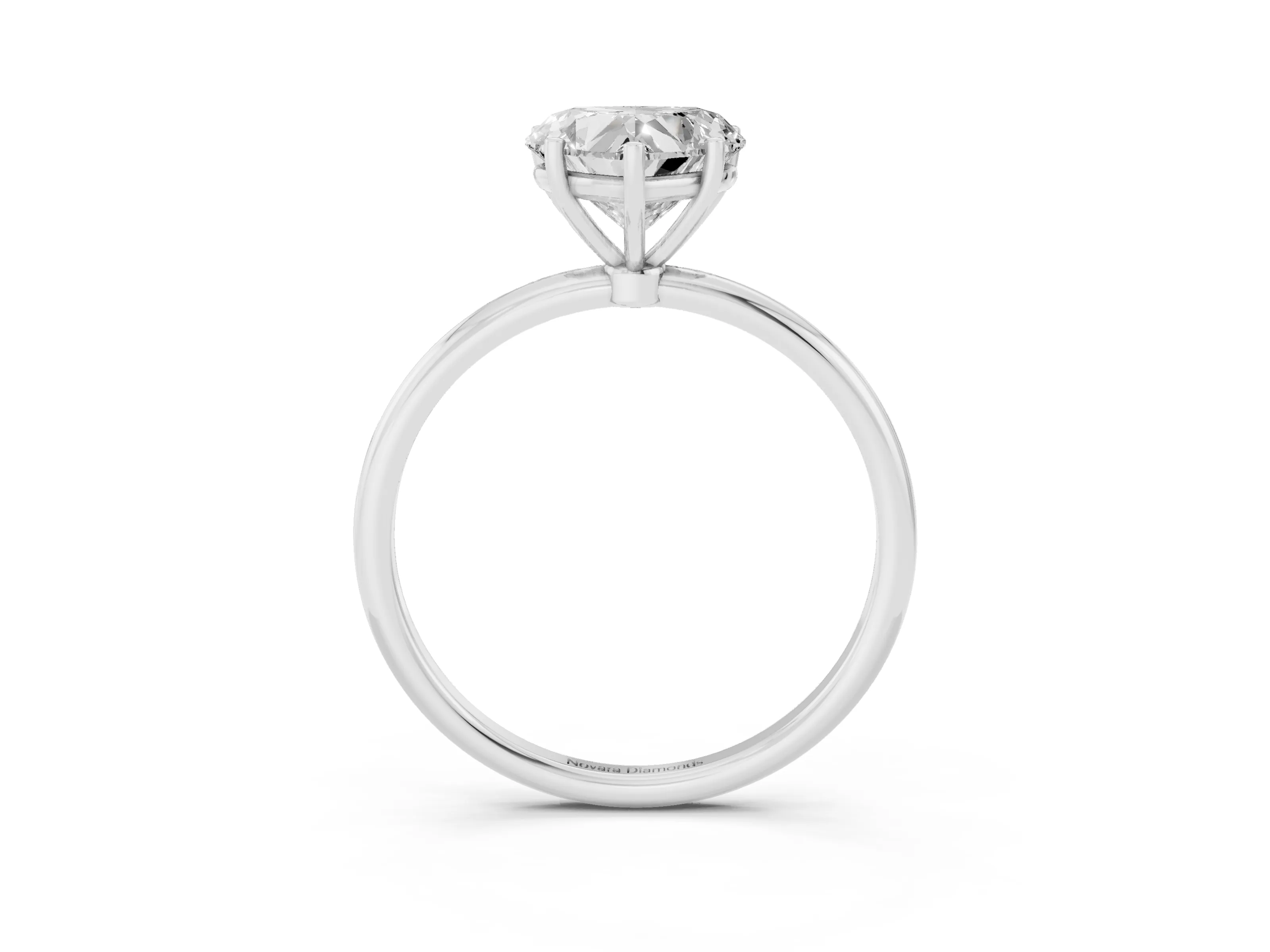 Heart Cut Diamond Solitaire Engagement Ring Set in Platinum with Thin Band and Prong Setting
