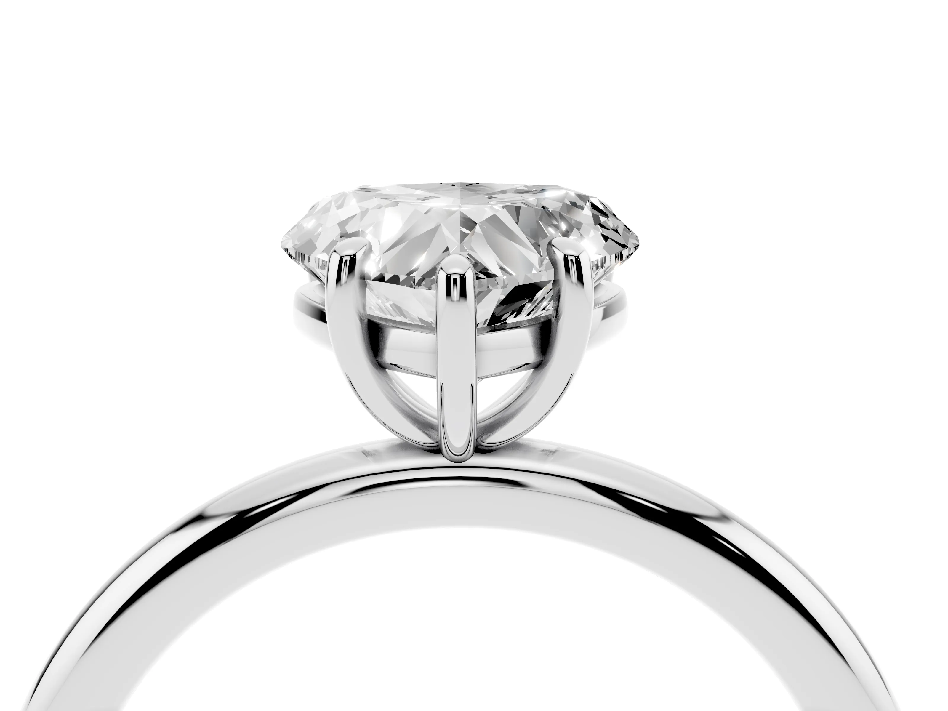 Heart Cut Diamond Solitaire Ring Set in Platinum with Prong Setting on a Polished Plain Band