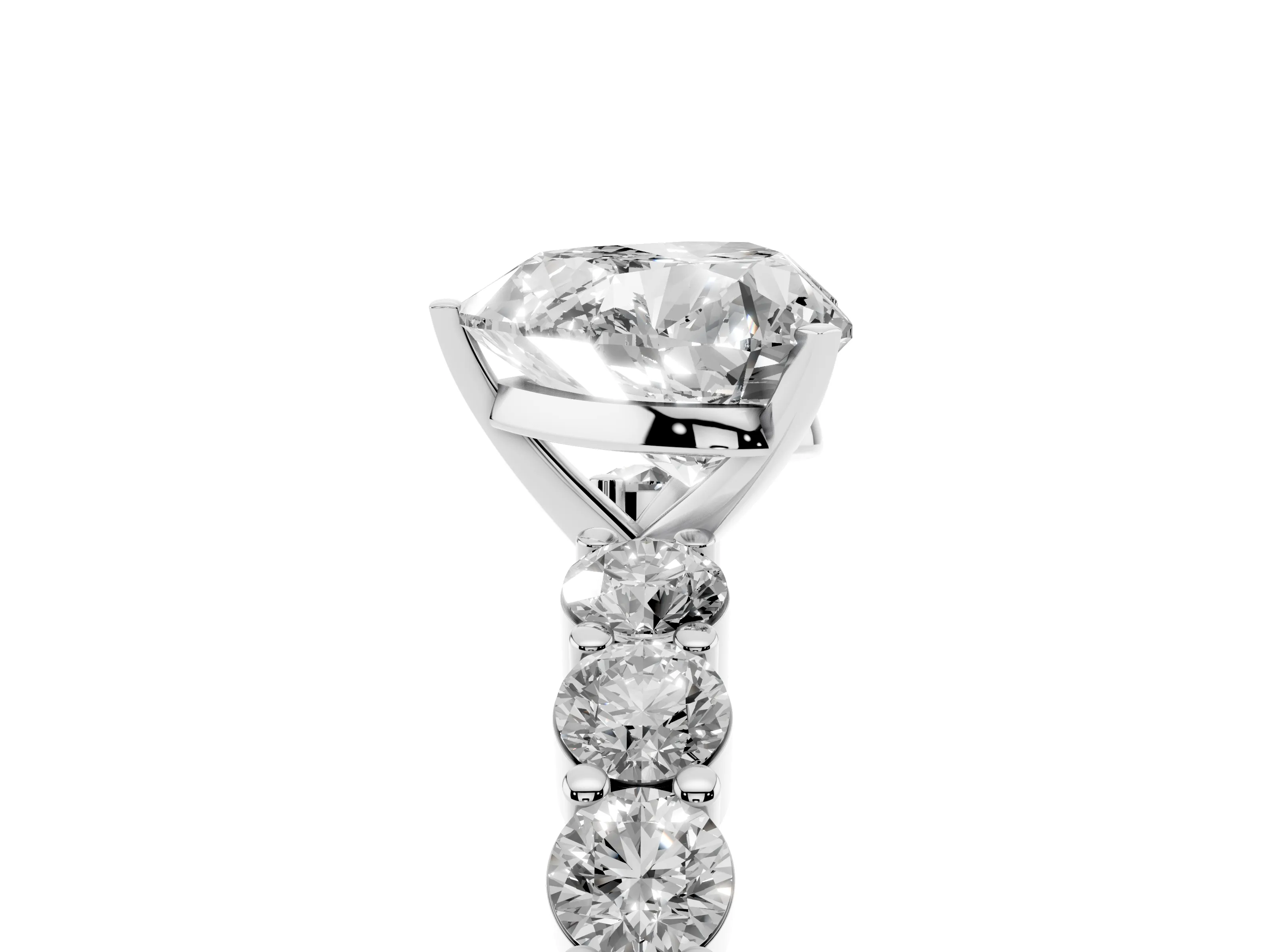 Heart Cut Diamond Solitaire Ring Set in White gold with Shared Prong Round Side Stones