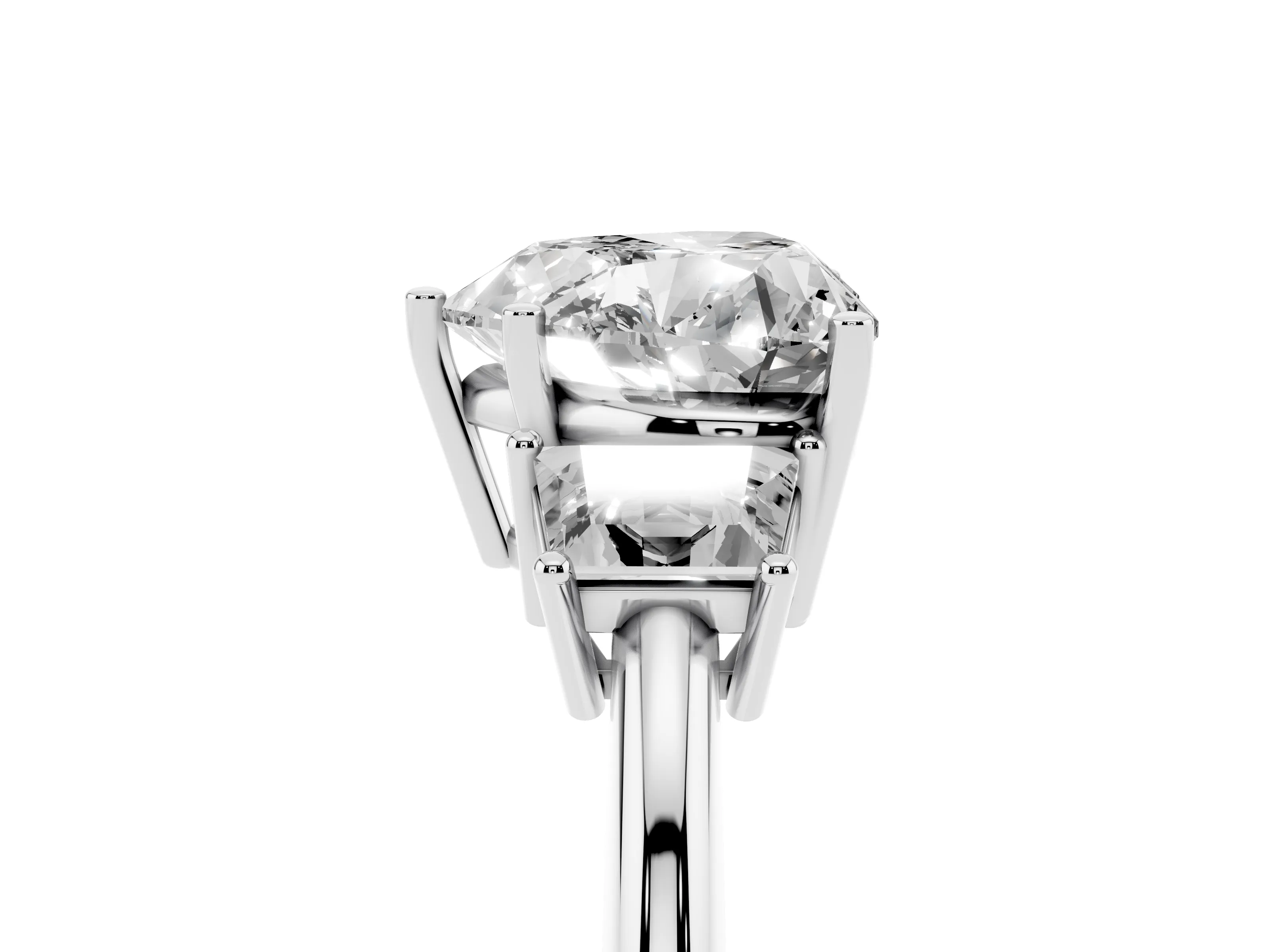 Heart Cut Diamond Three-Stone Ring Set in Platinum with Trapezoid Side Stones and Prong Setting