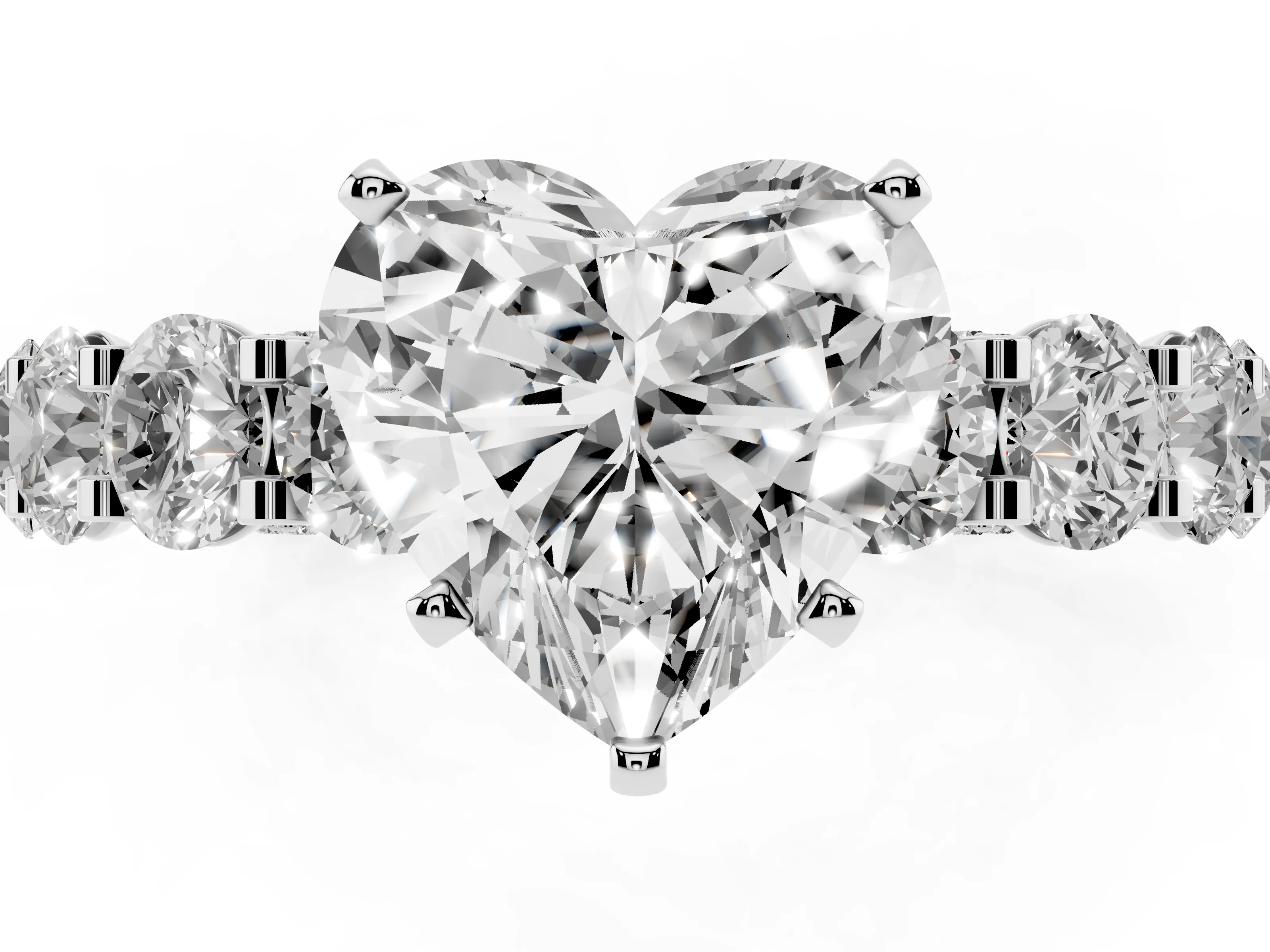 Heart Cut Diamond Side Stone Ring Set in Platinum with Alternating Round and Oval Side Stones