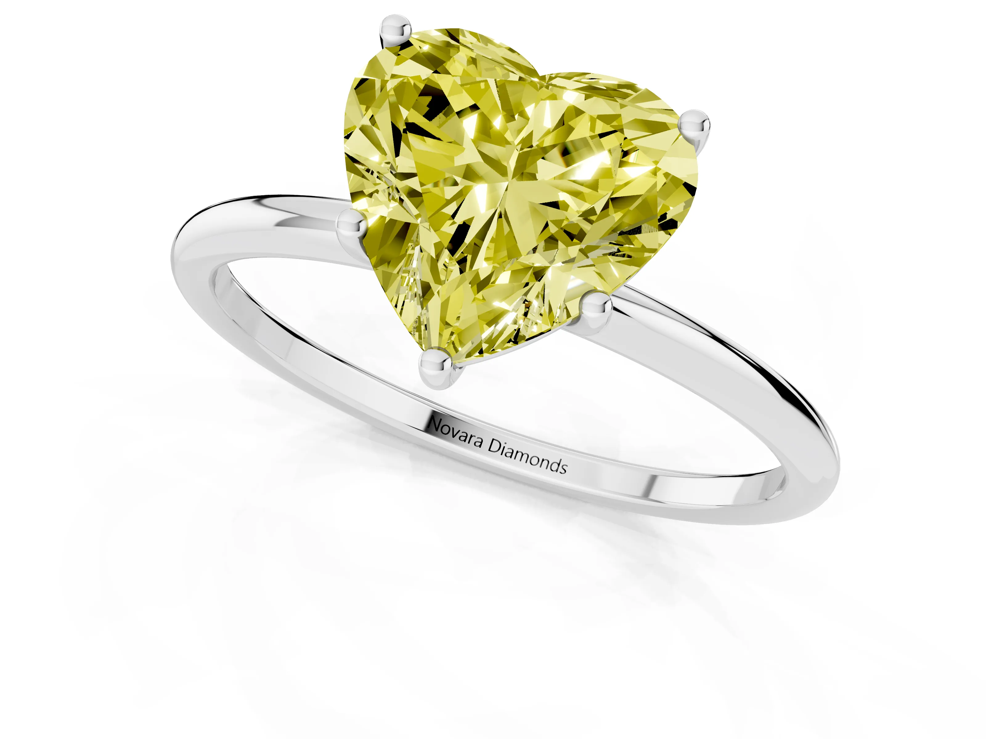 Fancy Yellow Heart Cut Diamond Solitaire Engagement Ring Set in Platinum with Thin Band and Prong Setting