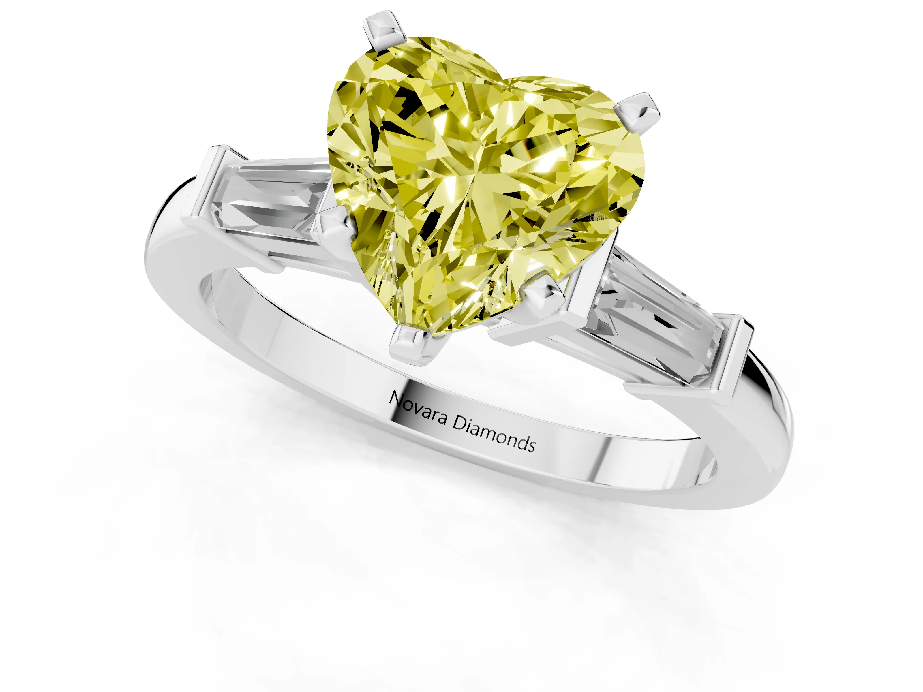 Fancy Yellow Heart Cut Diamond Solitaire Ring Set in White gold with Tapered Baguette Accents and Prong Setting