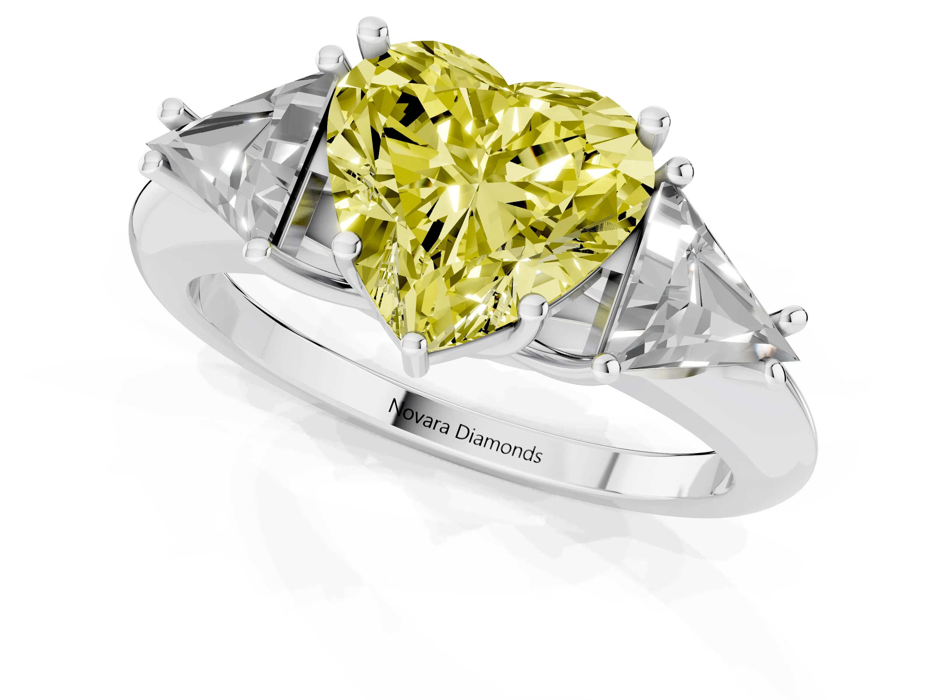 Fancy Yellow Heart Cut Diamond Three-Stone Engagement Ring Set in Platinum with Trillion Side Stones