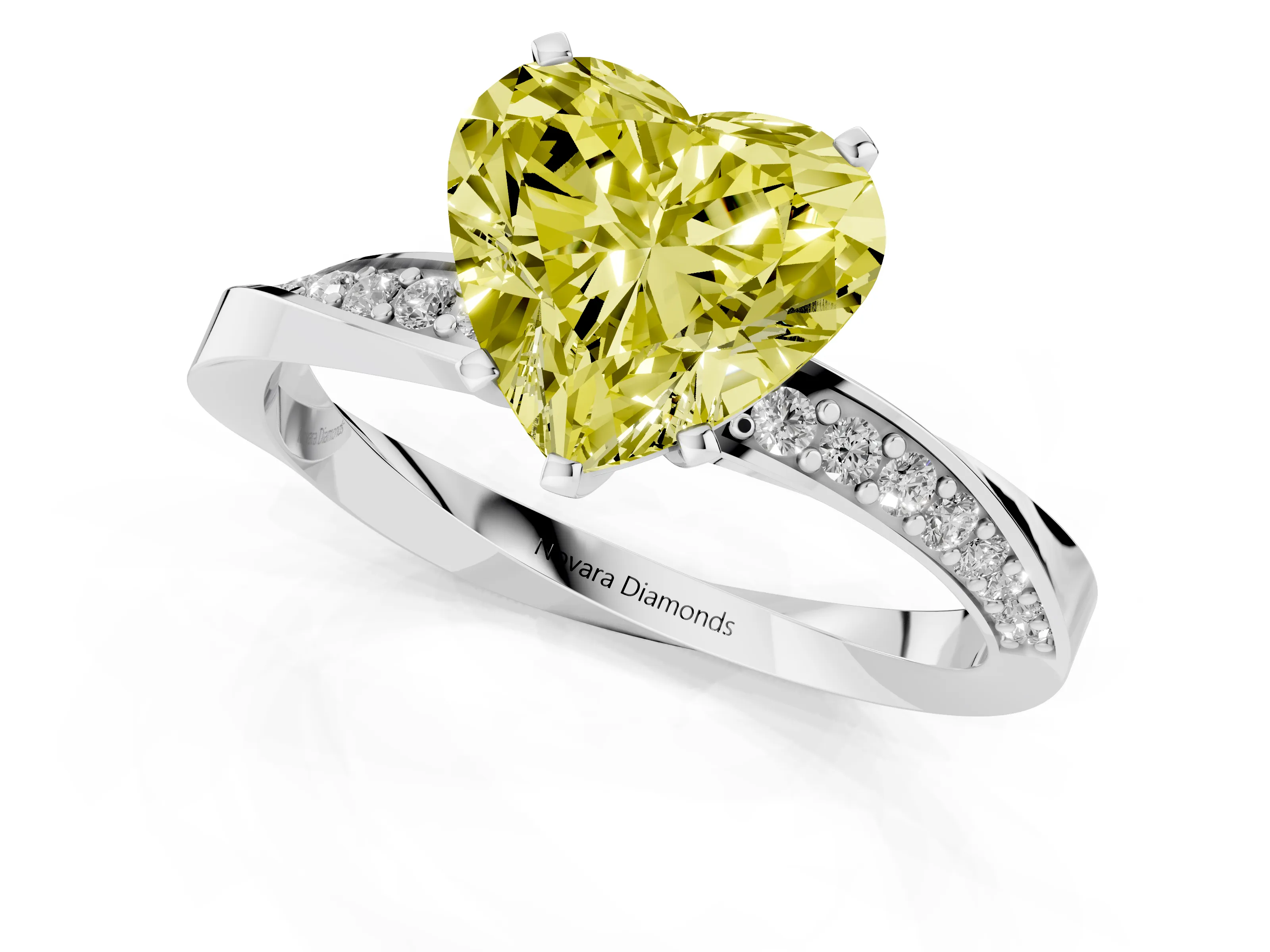 Fancy Yellow Heart Cut Diamond Engagement Ring Set in White gold with Side Stone Accents and Prong Setting