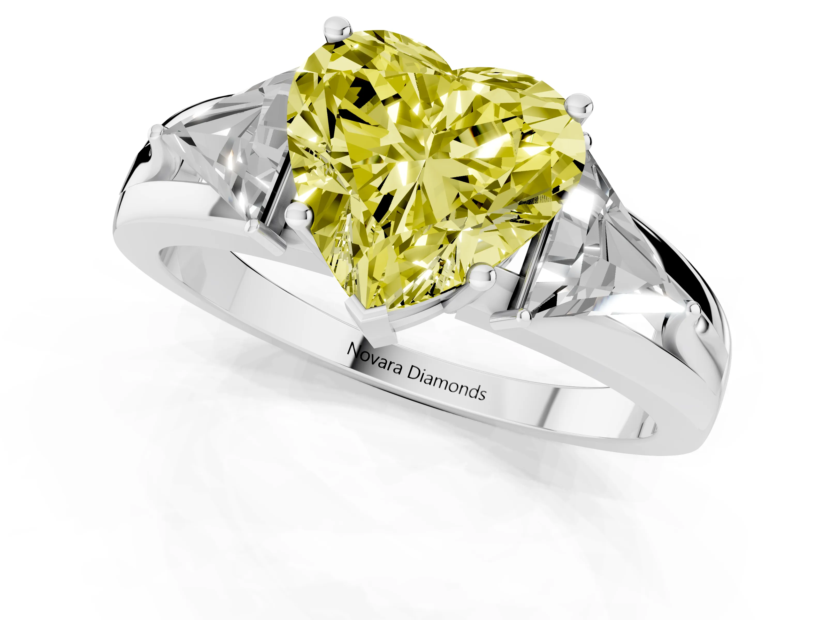 Fancy Yellow Heart Cut Diamond Three-Stone Ring Set in Platinum with Trillion Side Stones and Split Shank