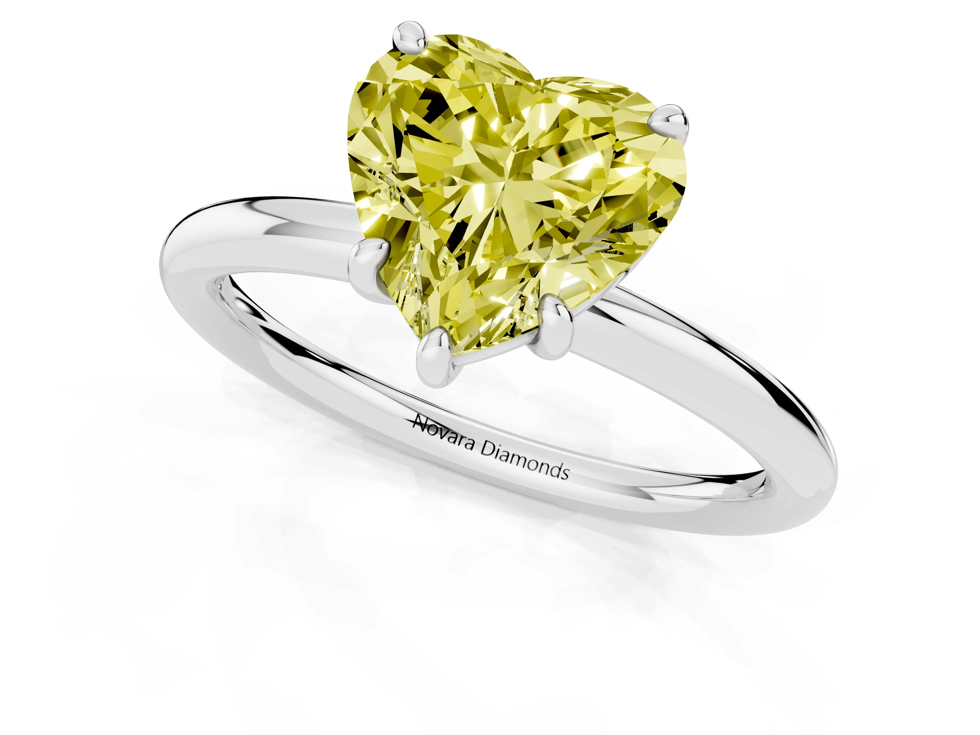 Fancy Yellow Heart Cut Diamond Solitaire Ring Set in Platinum with Prong Setting on a Polished Plain Band