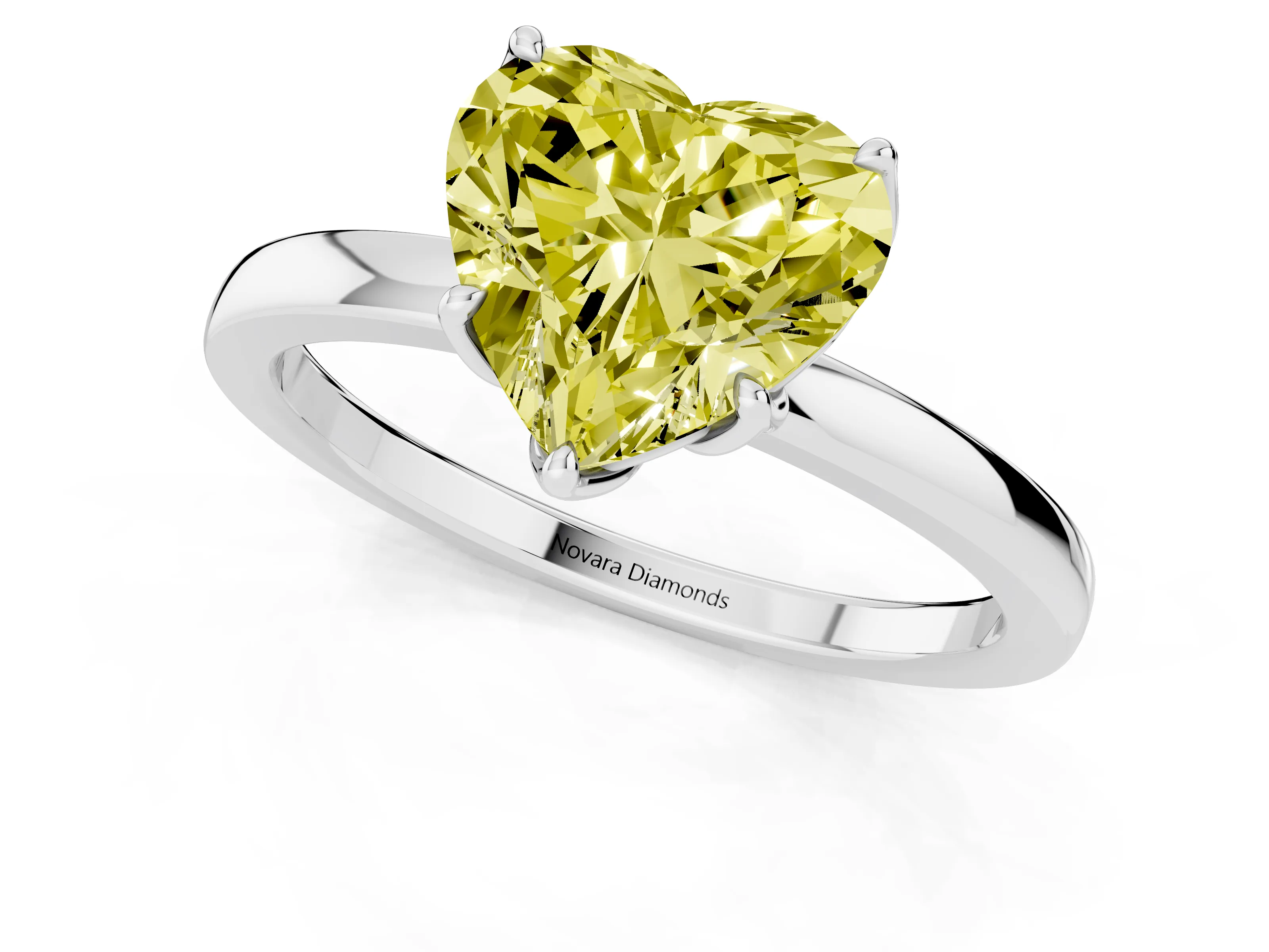 Fancy Yellow Heart Cut Diamond Solitaire Ring Set in White gold with Prong Setting and Thin Polished Band