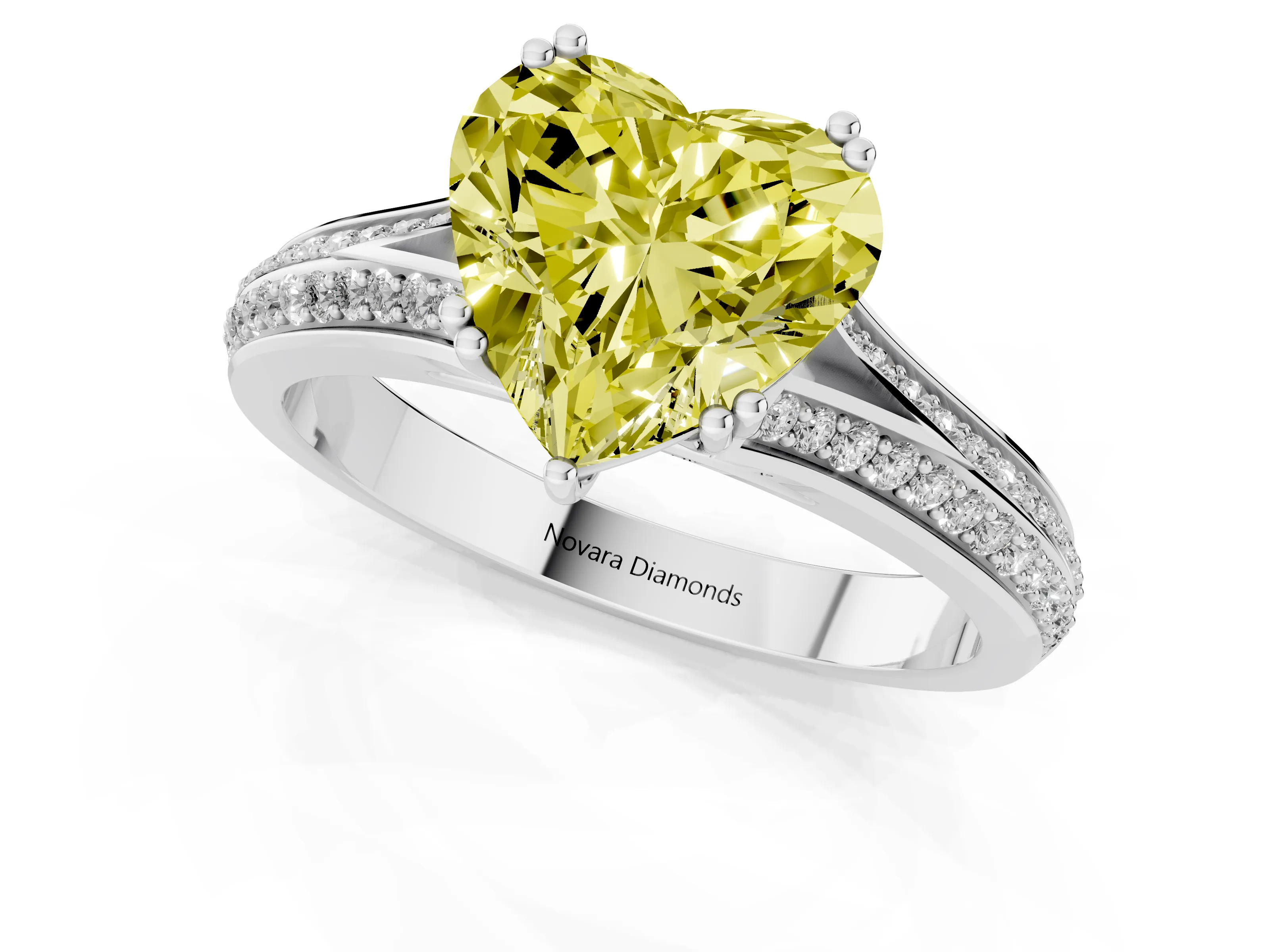 Fancy Yellow Heart Cut Diamond Split Shank Pavé Engagement Ring Set in White gold with Prong-Set Center Stone