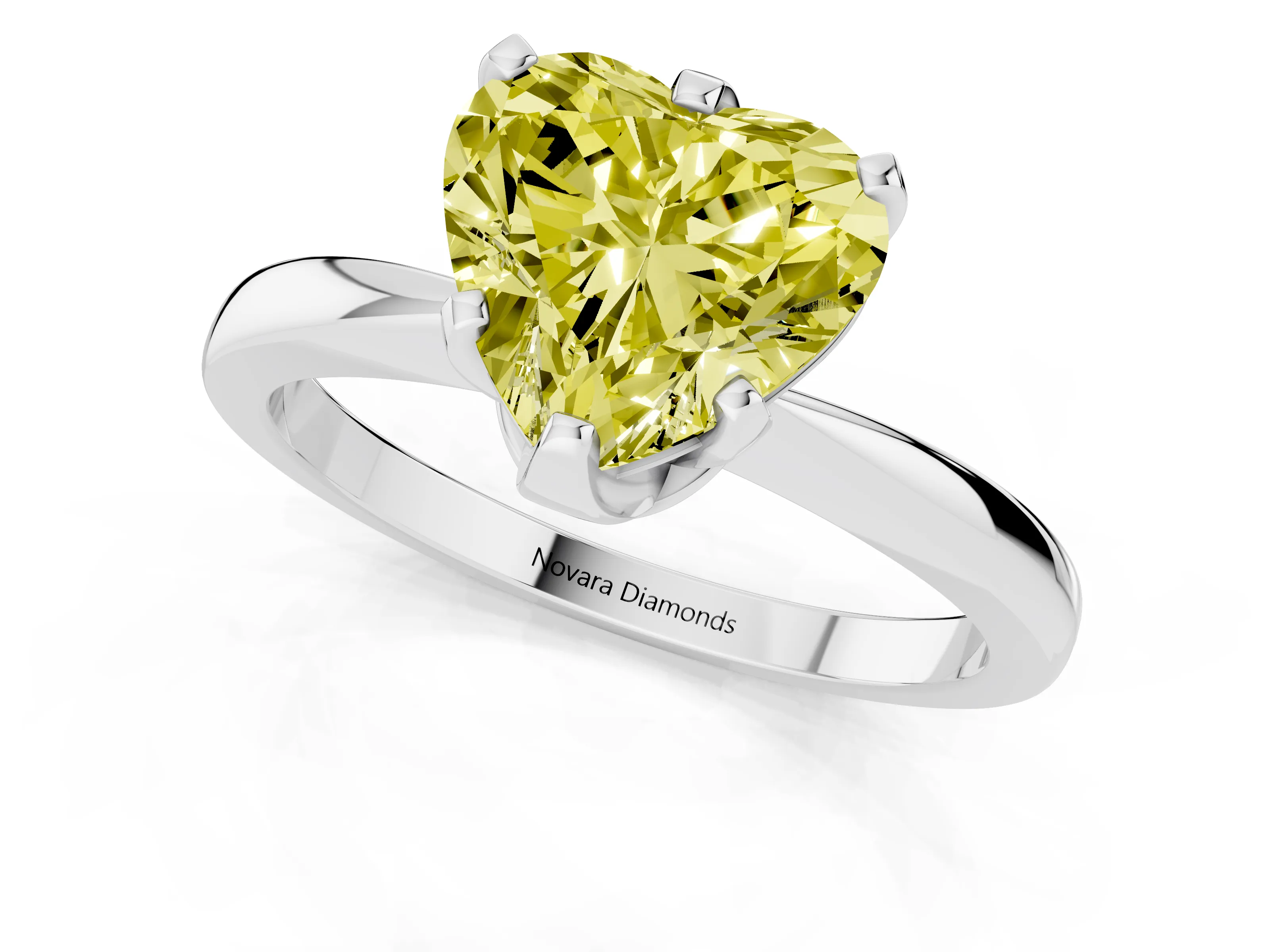 Fancy Yellow Heart Cut Diamond Solitaire Engagement Ring Set in White gold with Slim Tapered Solitaire Band