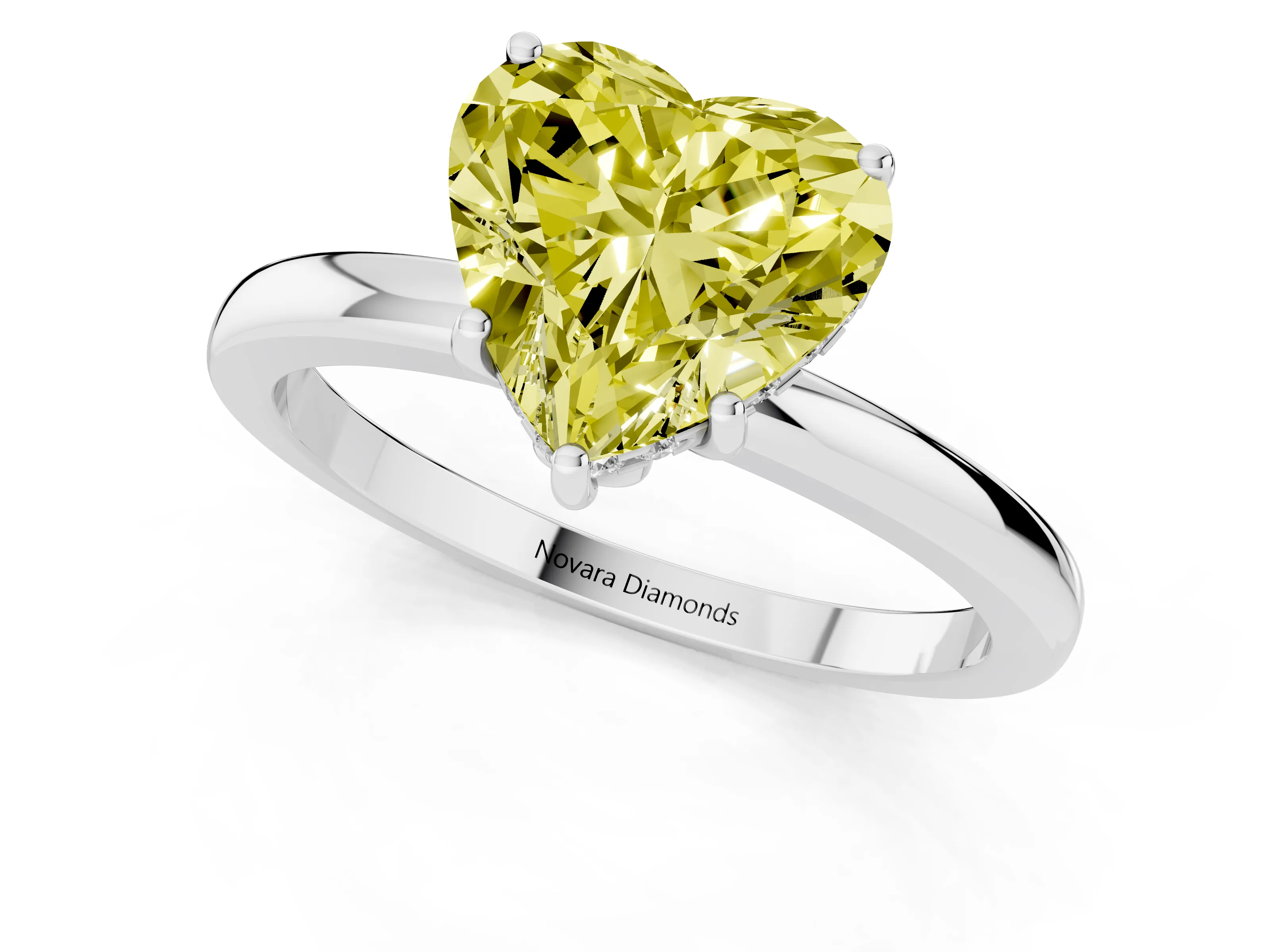 Fancy Yellow Heart Cut Diamond Solitaire Ring Set in White gold with Plain Band and Prong Setting