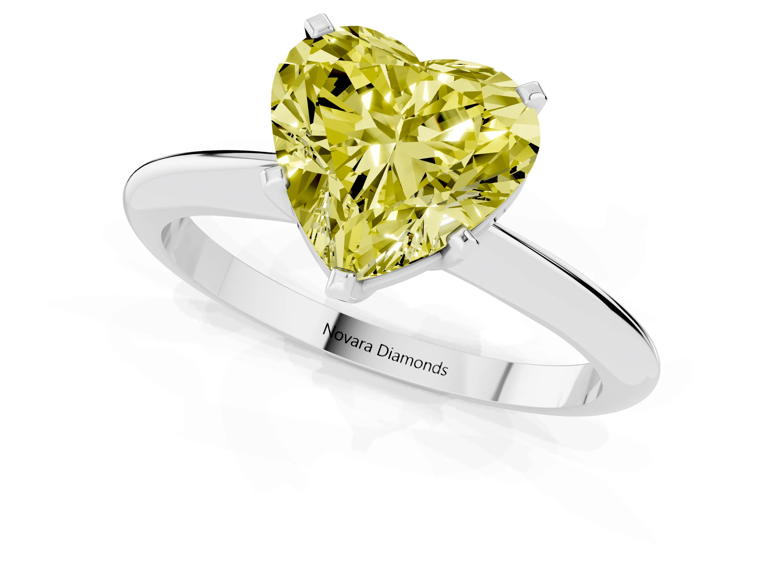 Fancy Yellow Heart Cut Diamond Solitaire Ring Set in White gold with Prong Setting on a Plain Round Band