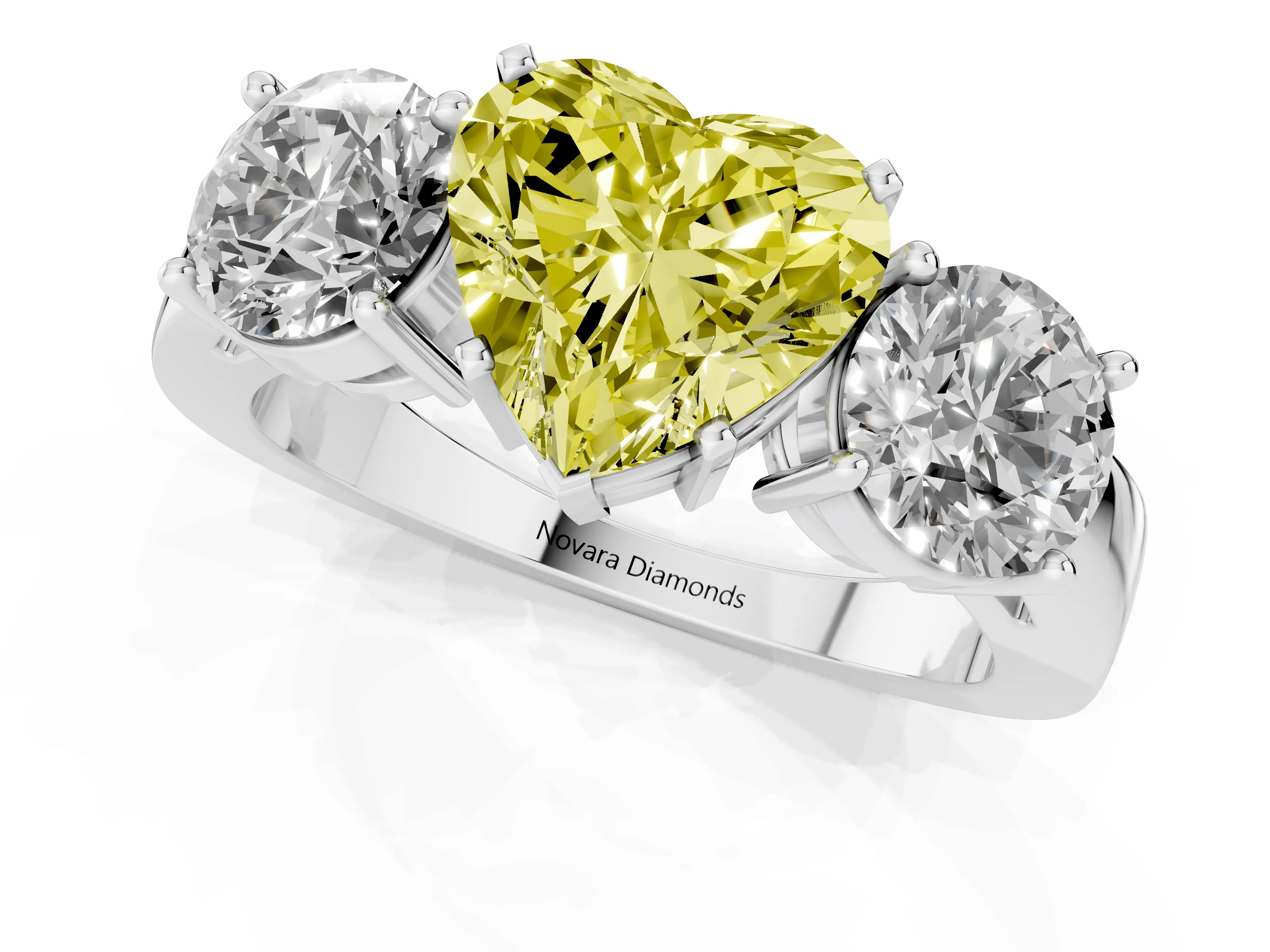 Fancy Yellow Heart Cut Diamond Three-Stone Ring Set in White gold with Round Side Stones and Classic Band