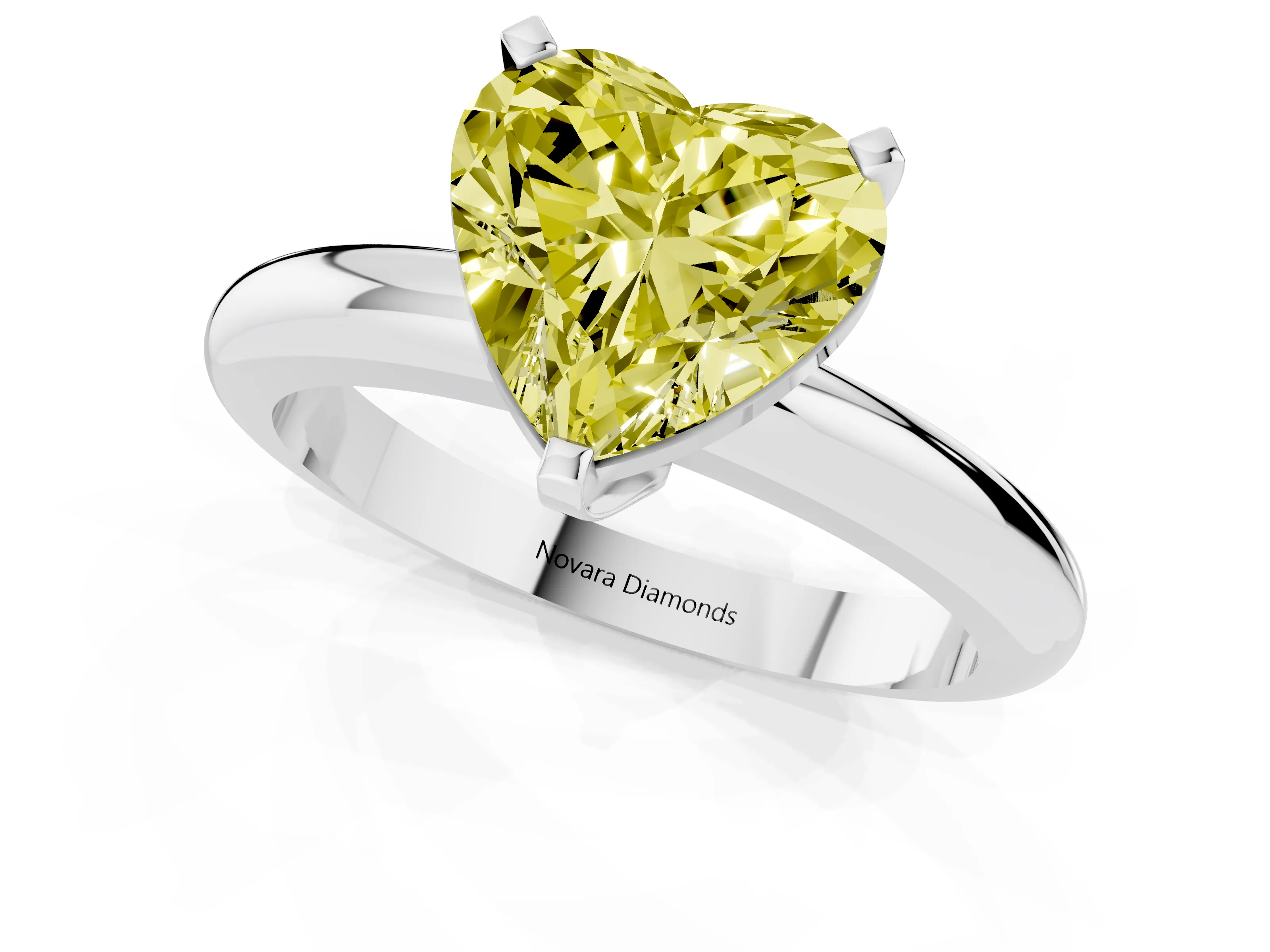 Fancy Yellow Heart Cut Diamond Solitaire Engagement Ring Set in White gold with Round Band and Prong Setting