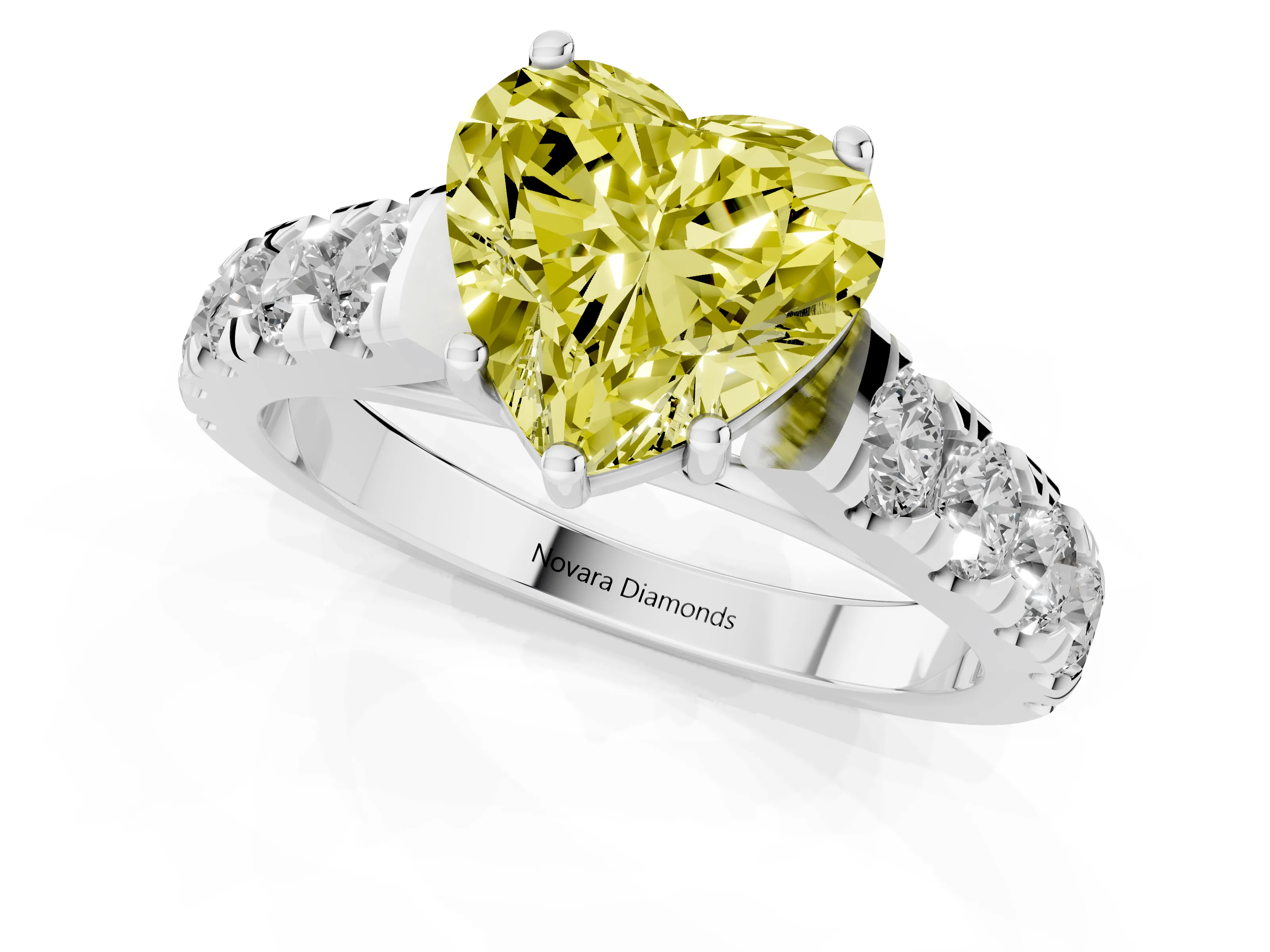 Fancy Yellow Heart Cut Diamond Solitaire Ring Set in White gold with Cut-Down Micro Pavé Band and Prong Setting
