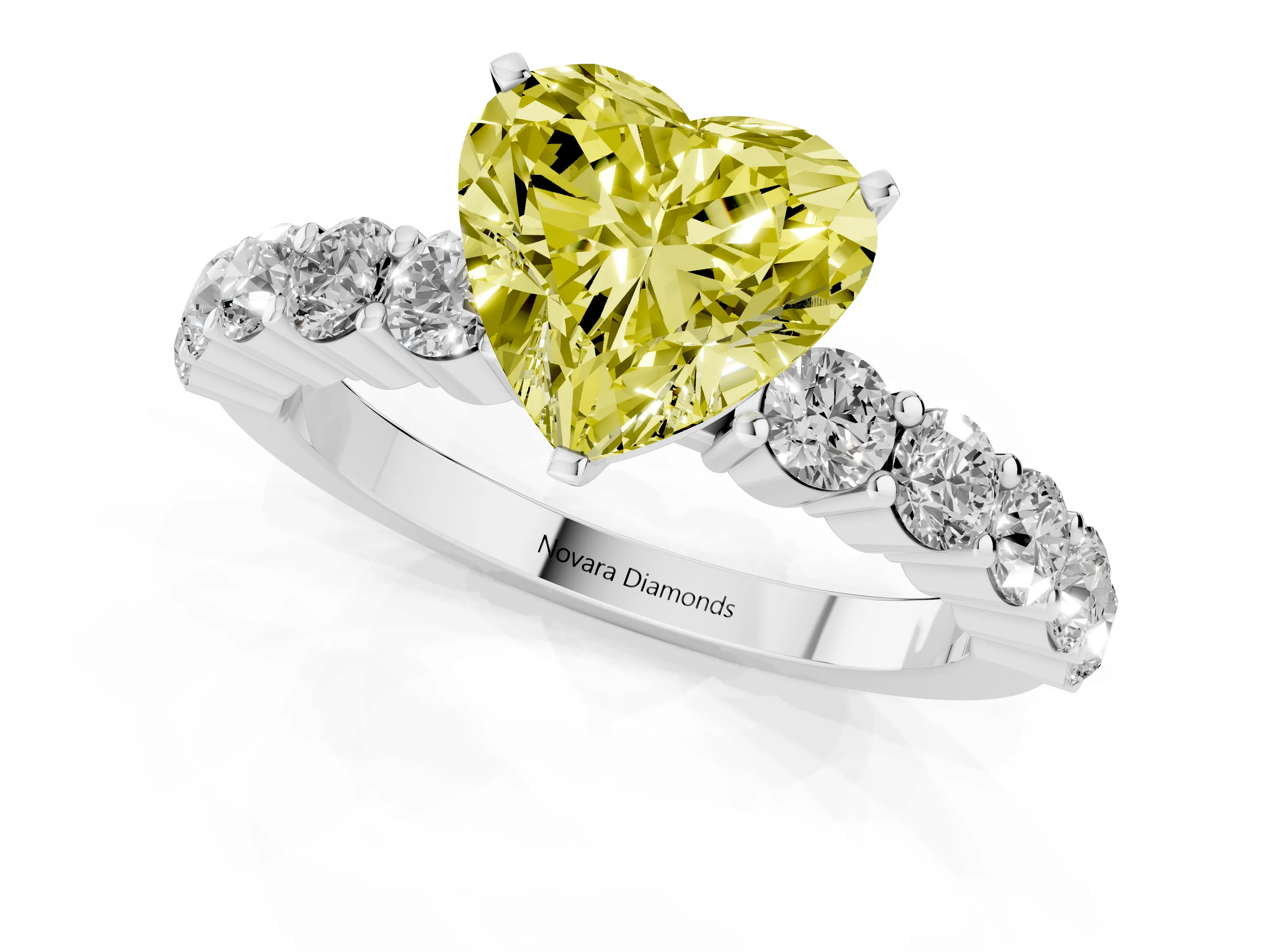 Fancy Yellow Heart Cut Diamond Solitaire Ring Set in White gold with Shared Prong Round Side Stones