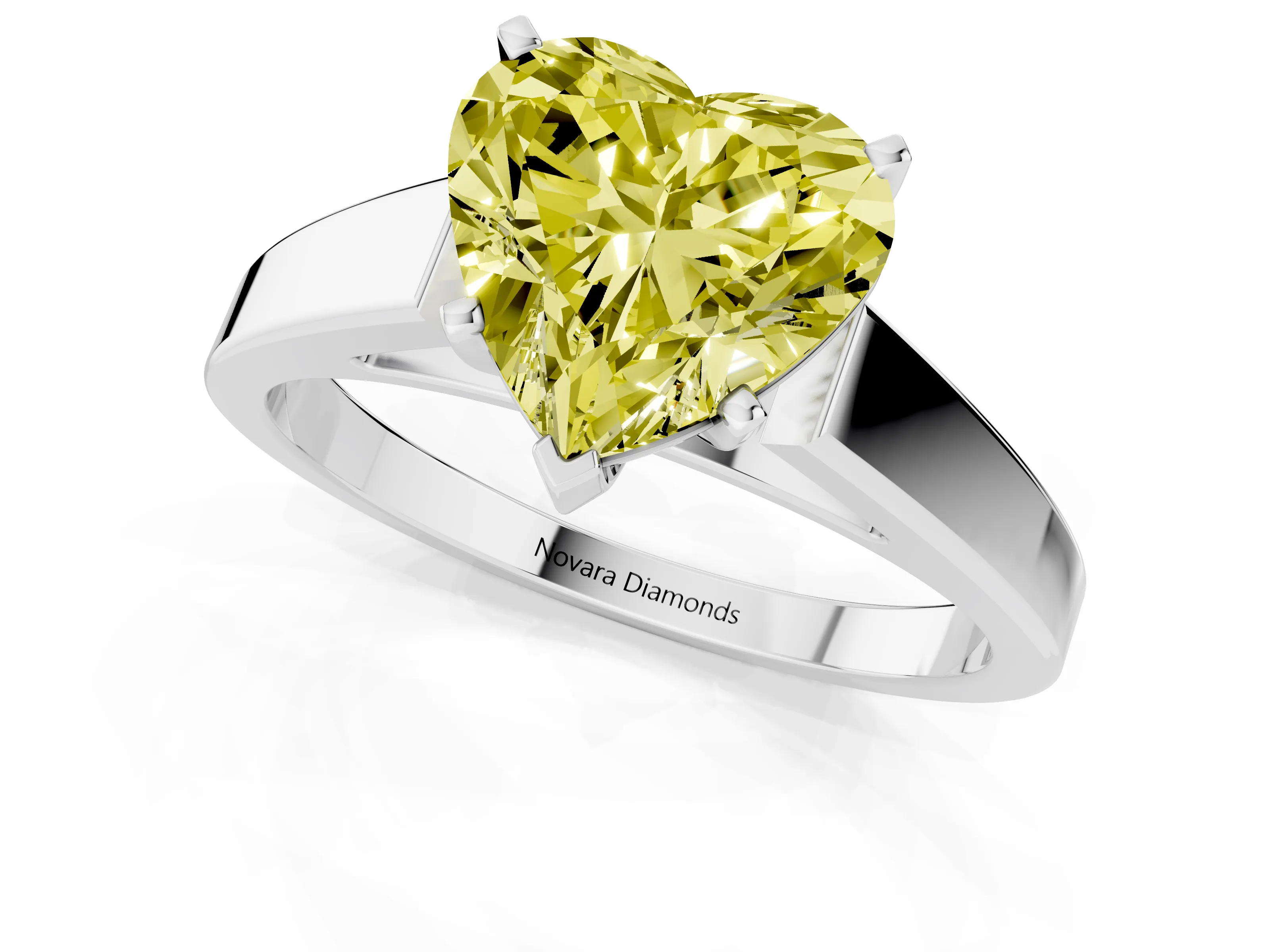 Fancy Yellow Heart Cut Diamond Solitaire Engagement Ring Set in White gold with Prong Setting and Tapered Band
