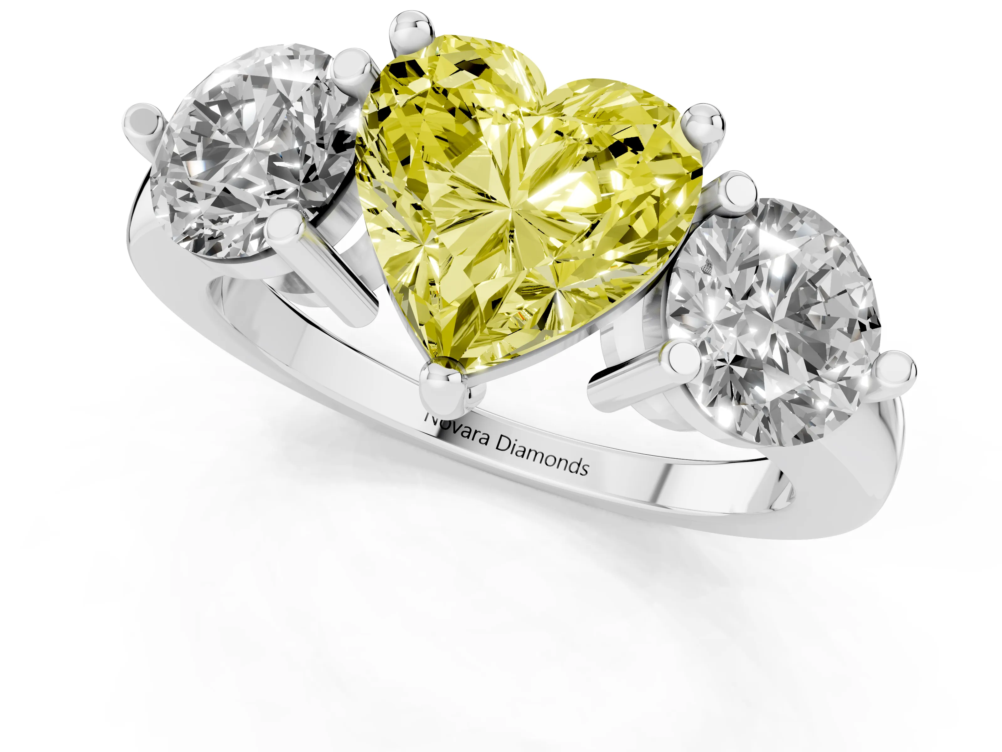 Fancy Yellow Heart Cut Diamond Three-Stone Ring Set in Platinum with Prong Setting and Classic Band