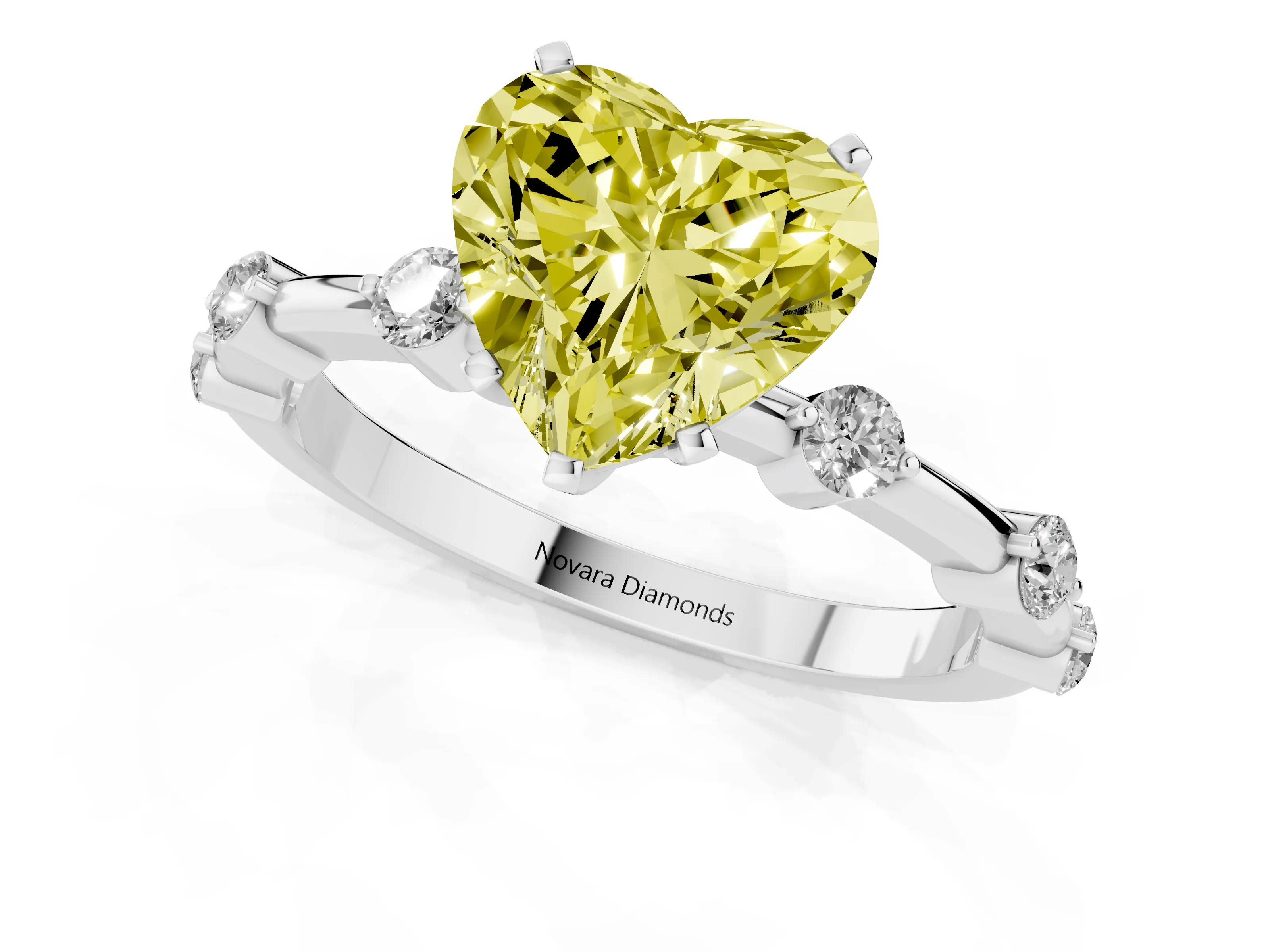 Fancy Yellow Heart Cut Diamond Solitaire Ring Set in Platinum with Bezel Set Side Stones and Prong Setting