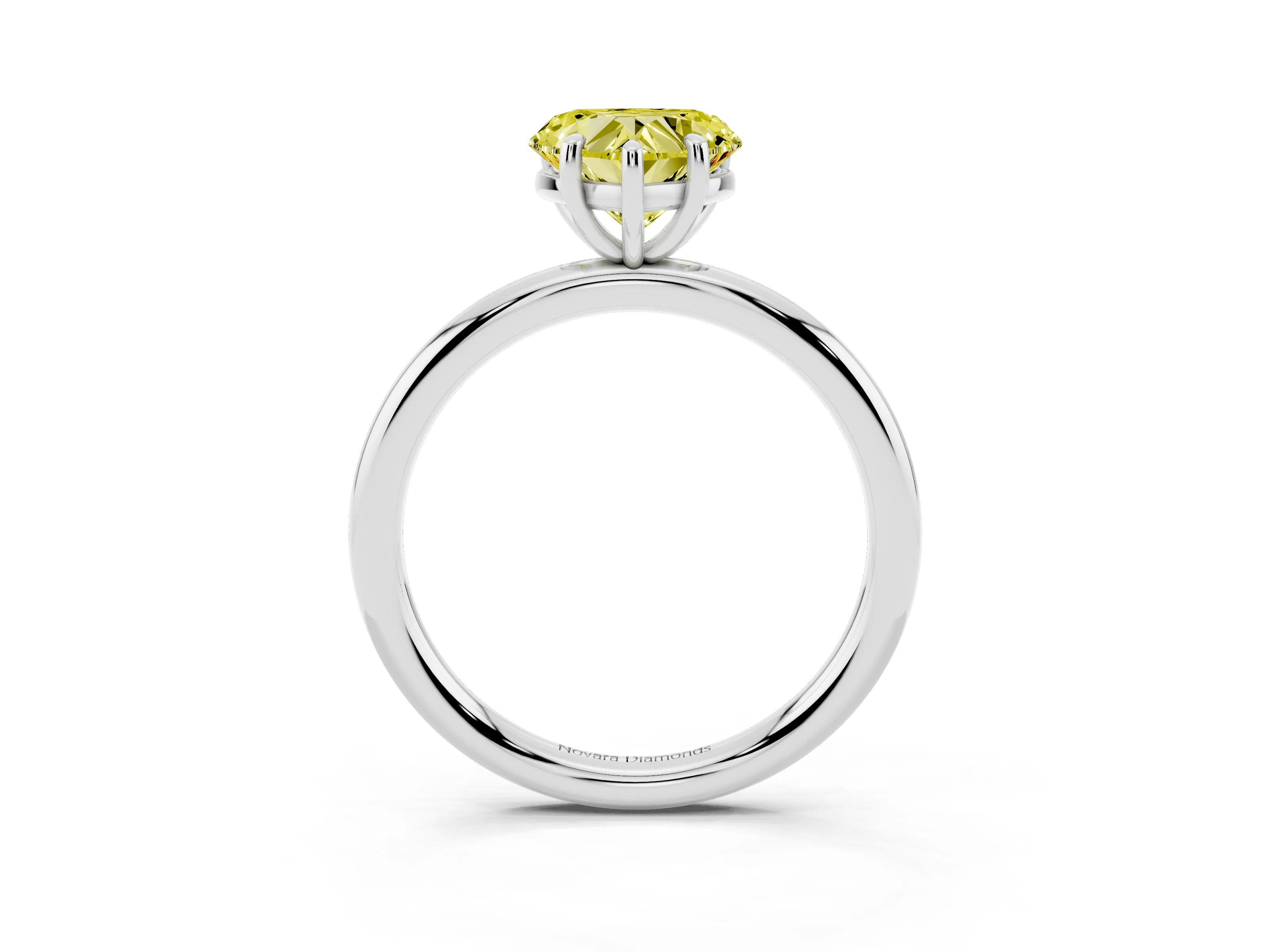 Fancy Yellow Heart Cut Diamond Solitaire Ring Set in Platinum with Prong Setting on a Polished Plain Band
