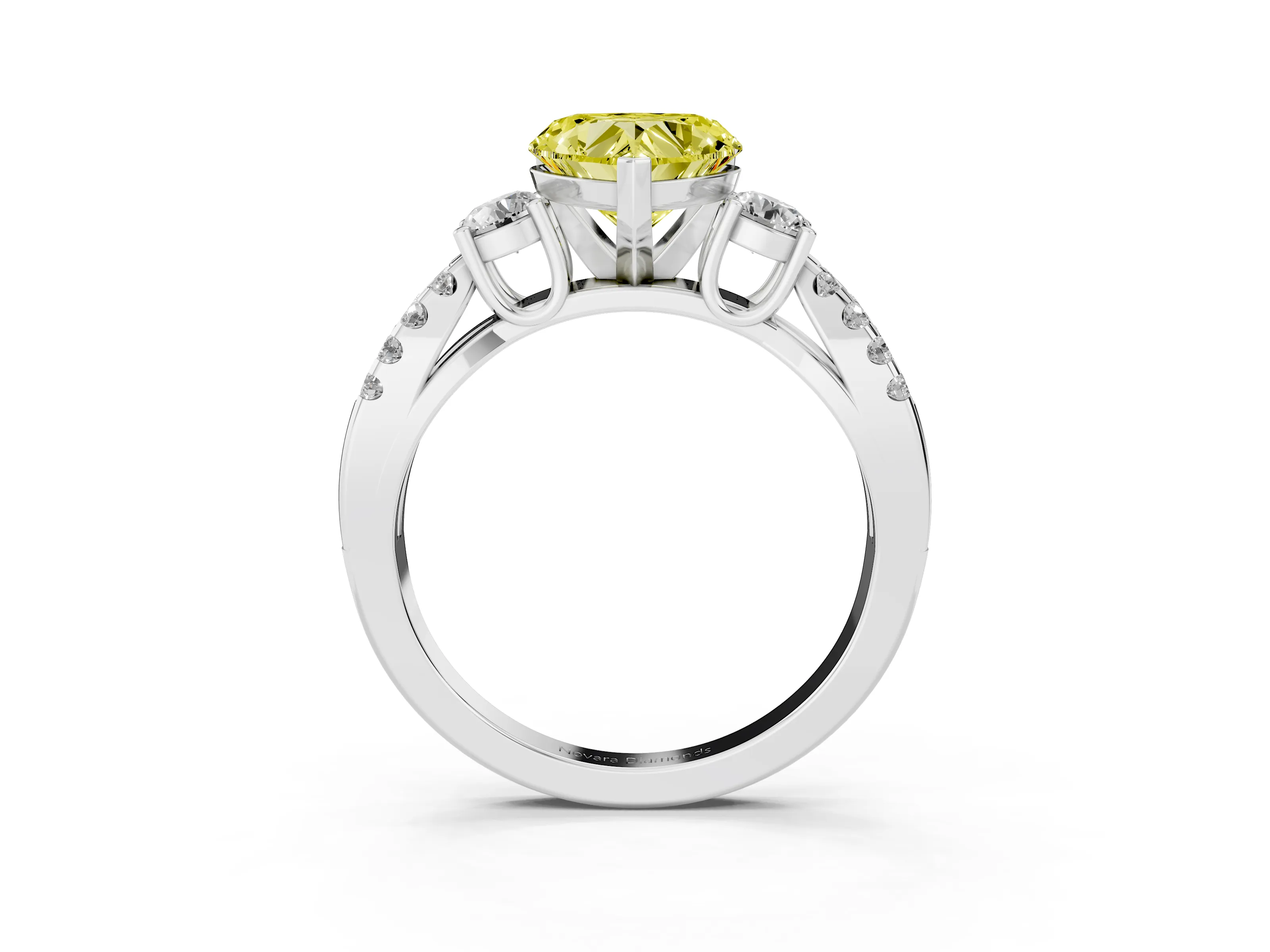 Fancy Yellow Heart Cut Diamond Three-Stone Ring Set in Platinum with Pavé Split Shank and Prong Setting