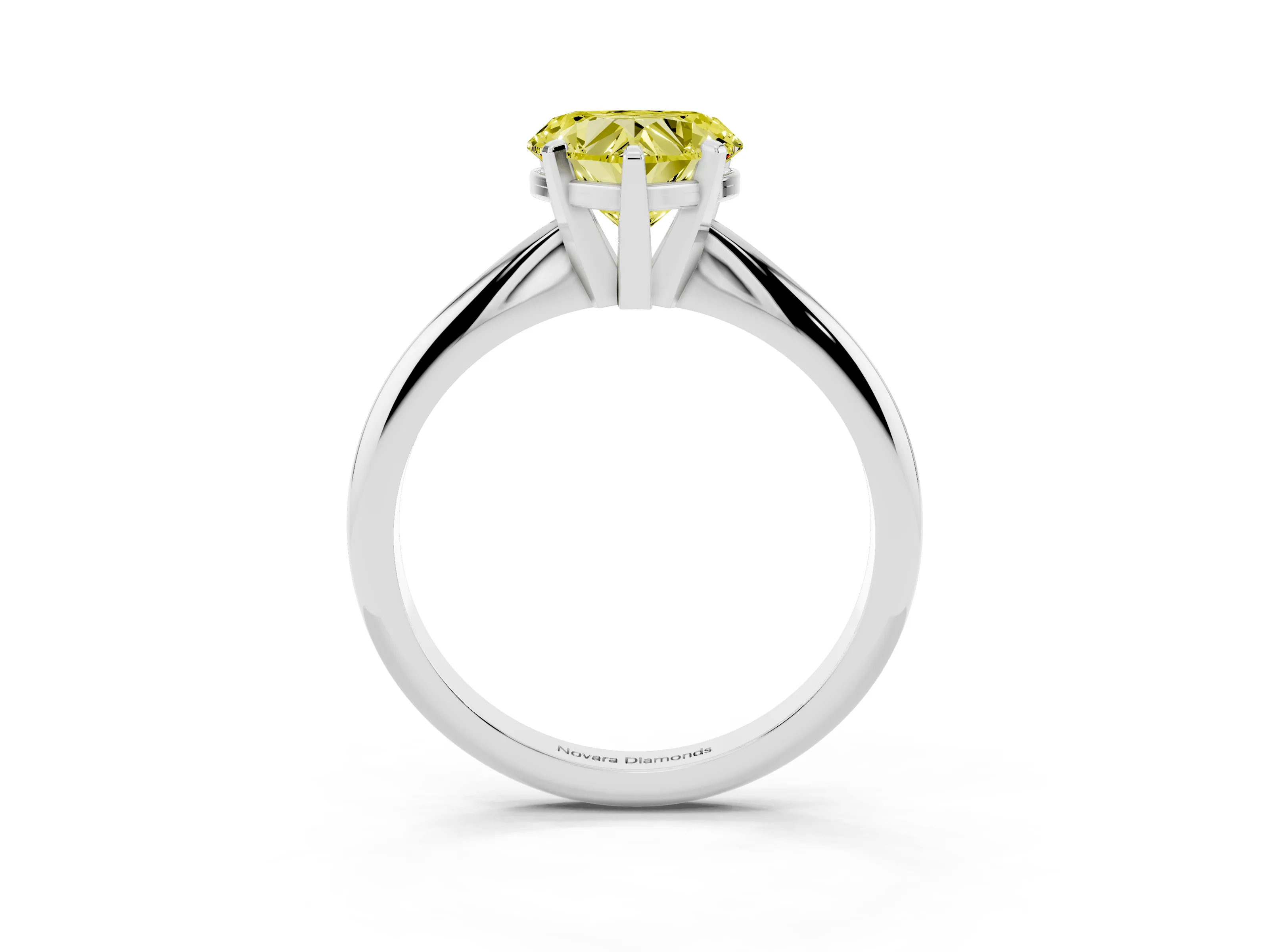 Fancy Yellow Heart Cut Diamond Solitaire Ring Set in White gold with Prong Setting on a Plain Round Band