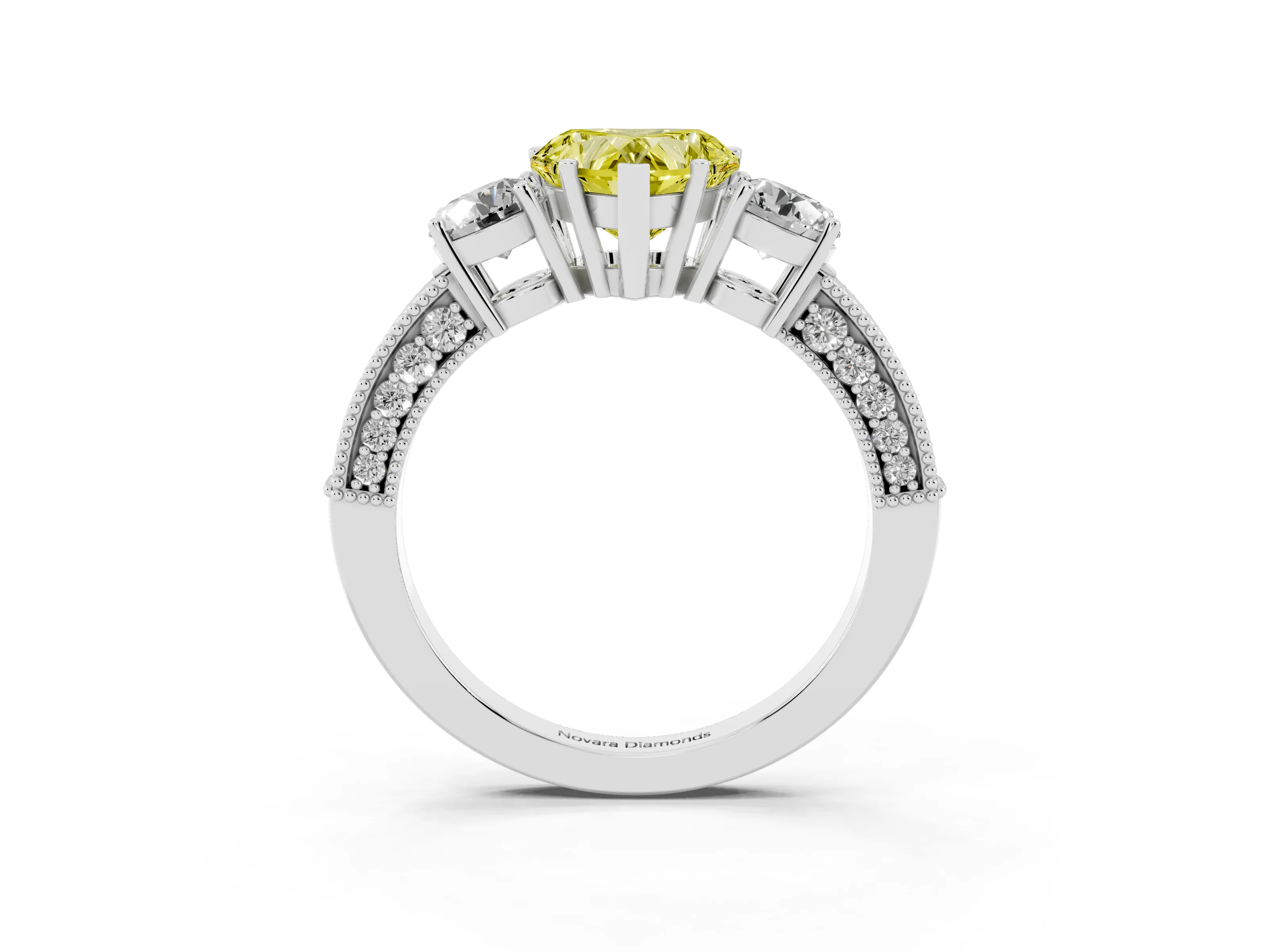 Fancy Yellow Heart Cut Diamond Three-Stone Ring Set in White gold with Round Side Stones and Pavé Band