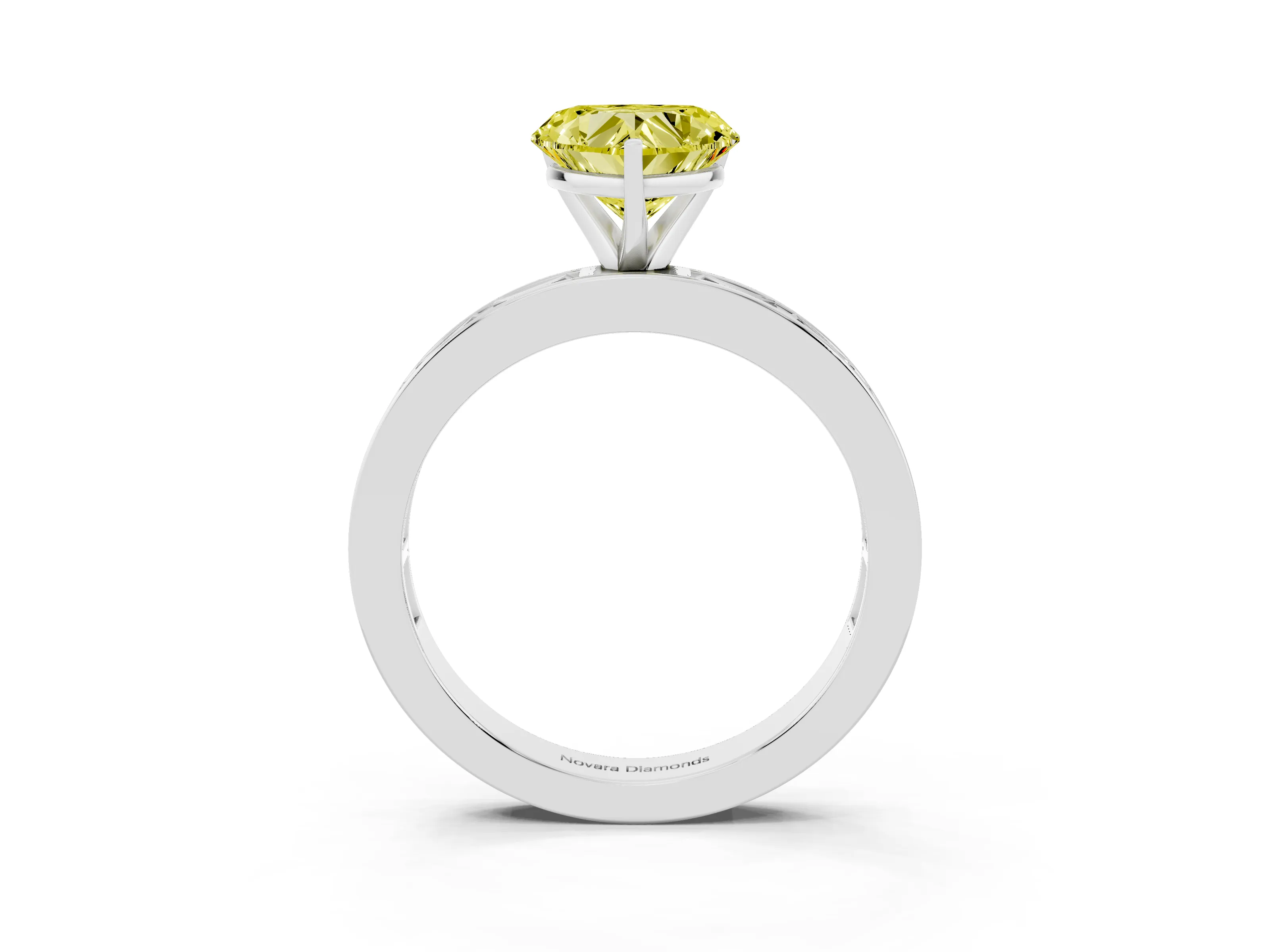 Fancy Yellow Heart Cut Diamond Solitaire Ring Set in White gold with Channel-Set Baguette Band and Prong Setting