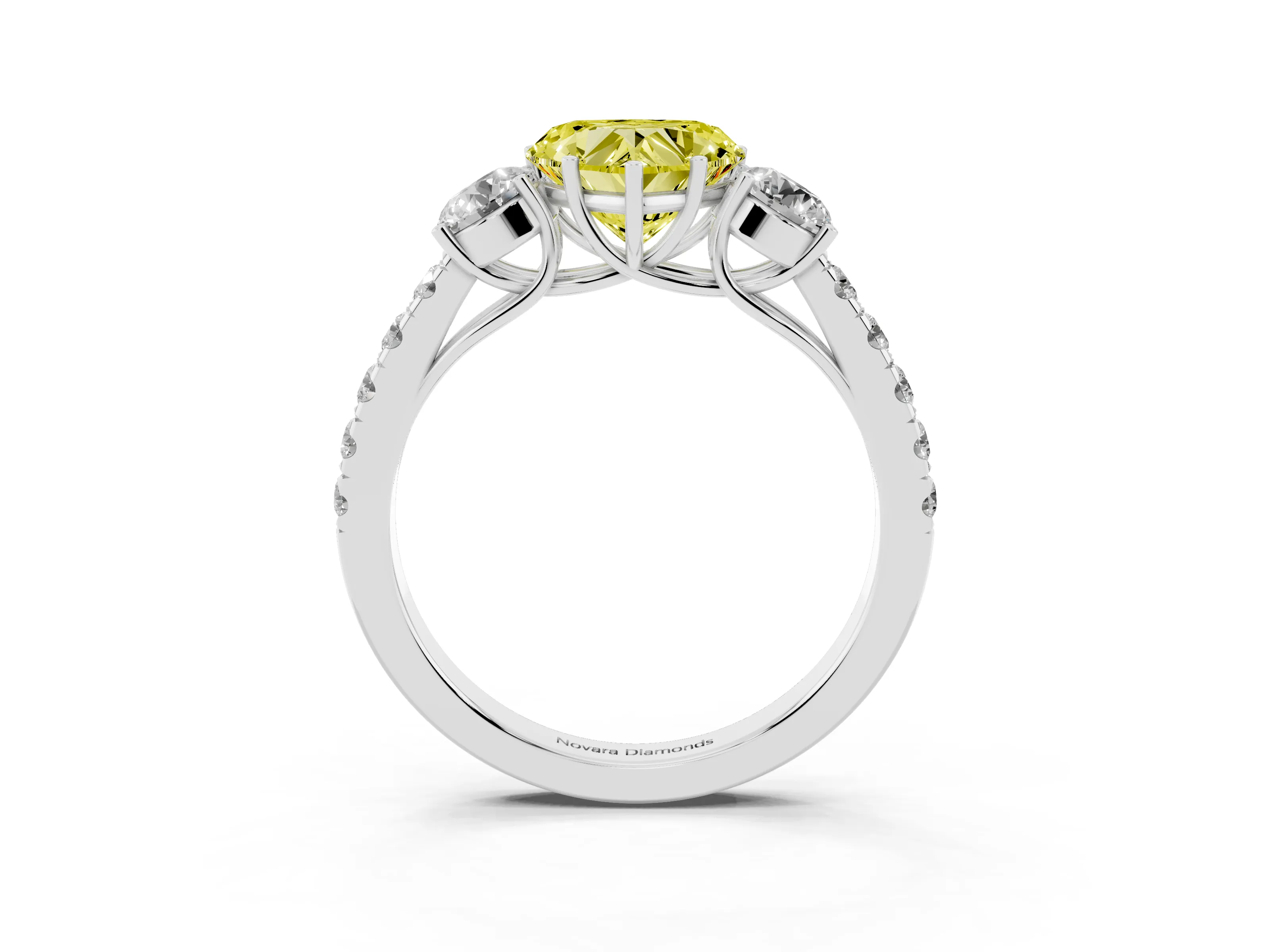 Fancy Yellow Heart Cut Diamond Three-Stone Ring Set in White gold with Round Side Stones and Delicate Pavé Band
