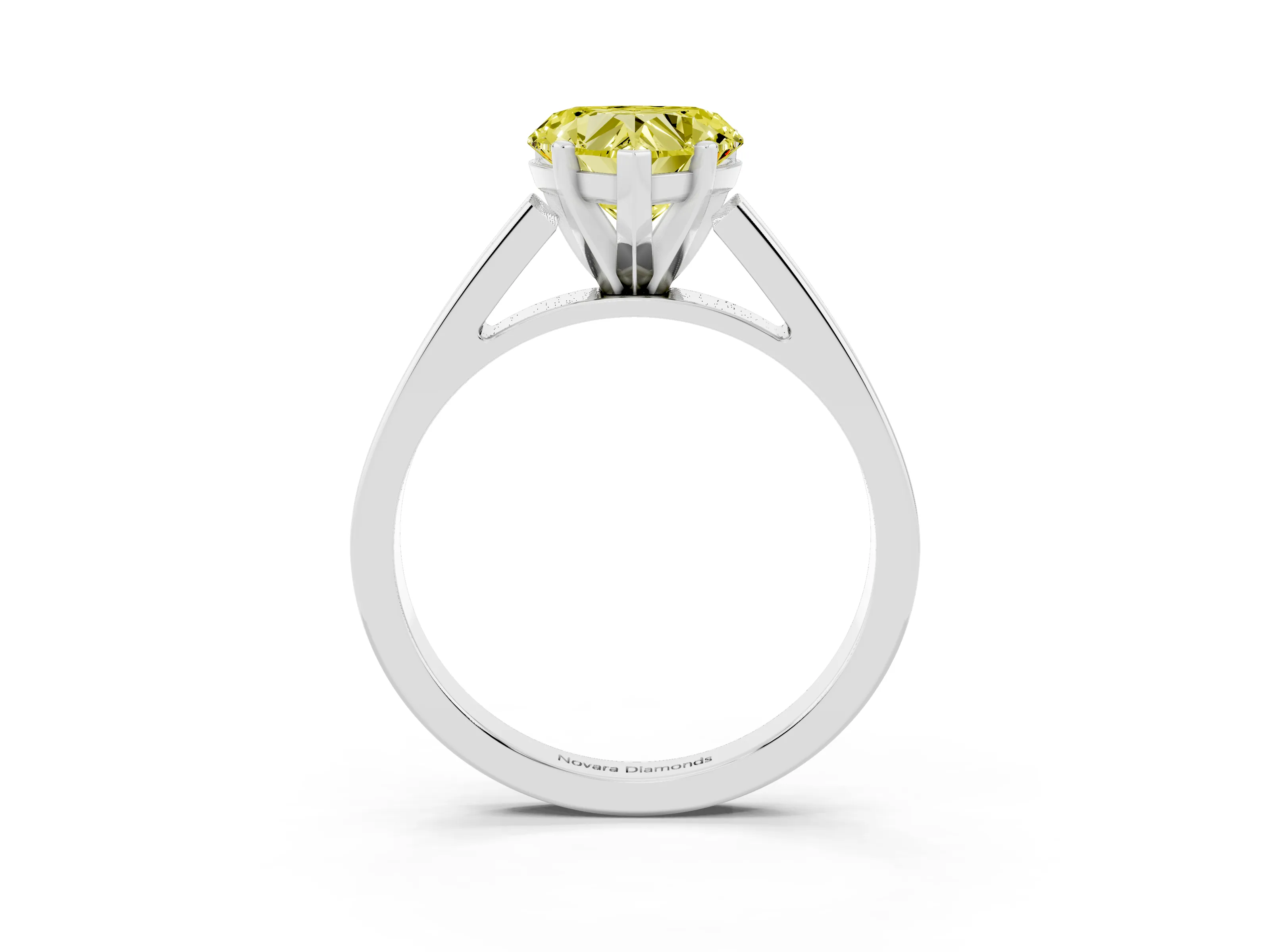 Fancy Yellow Heart Cut Diamond Solitaire Engagement Ring Set in White gold with Prong Setting and Tapered Band