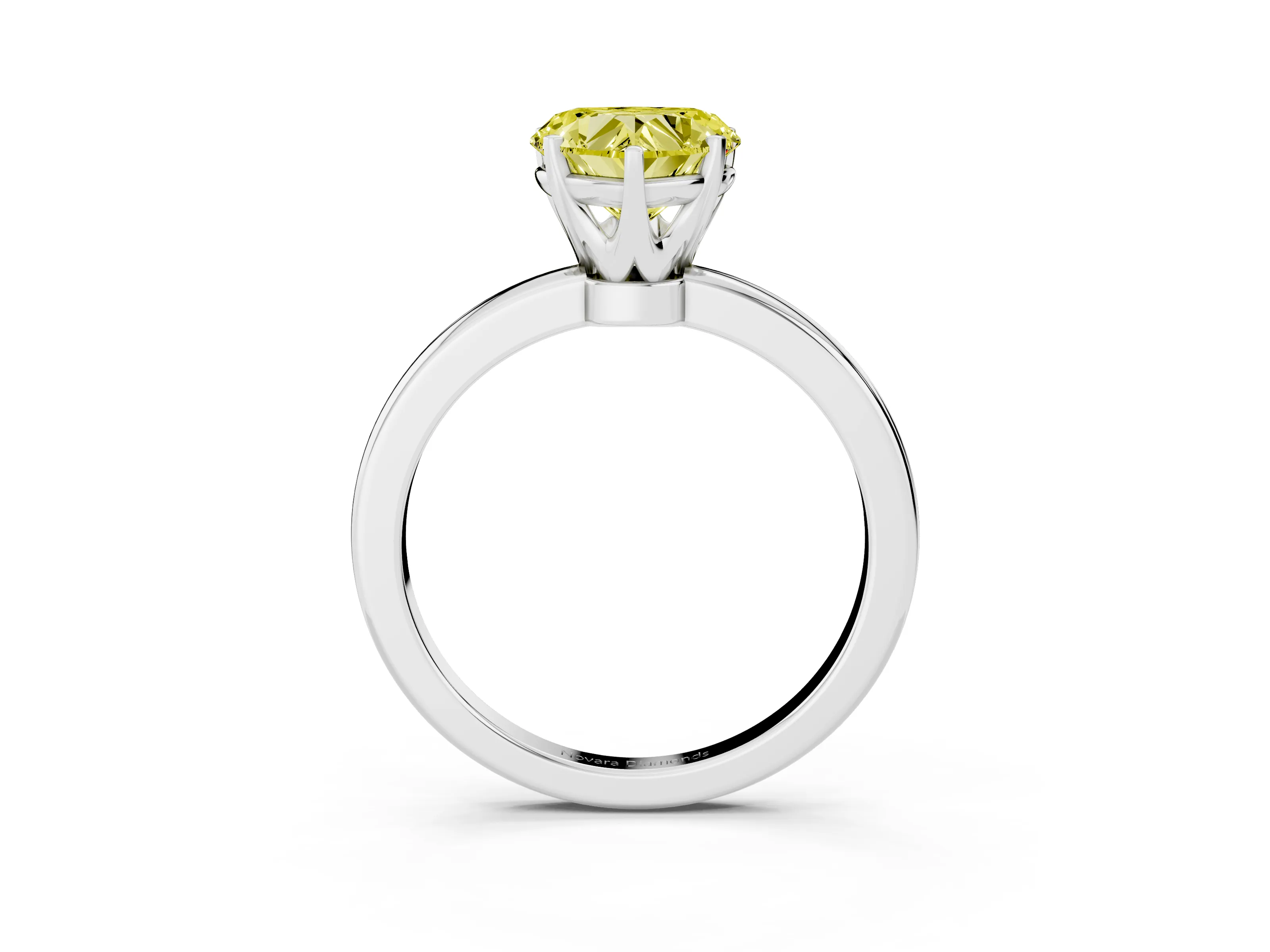 Fancy Yellow Heart Cut Diamond Solitaire Ring Set in White gold with Raised Prong Setting on a Classic Band