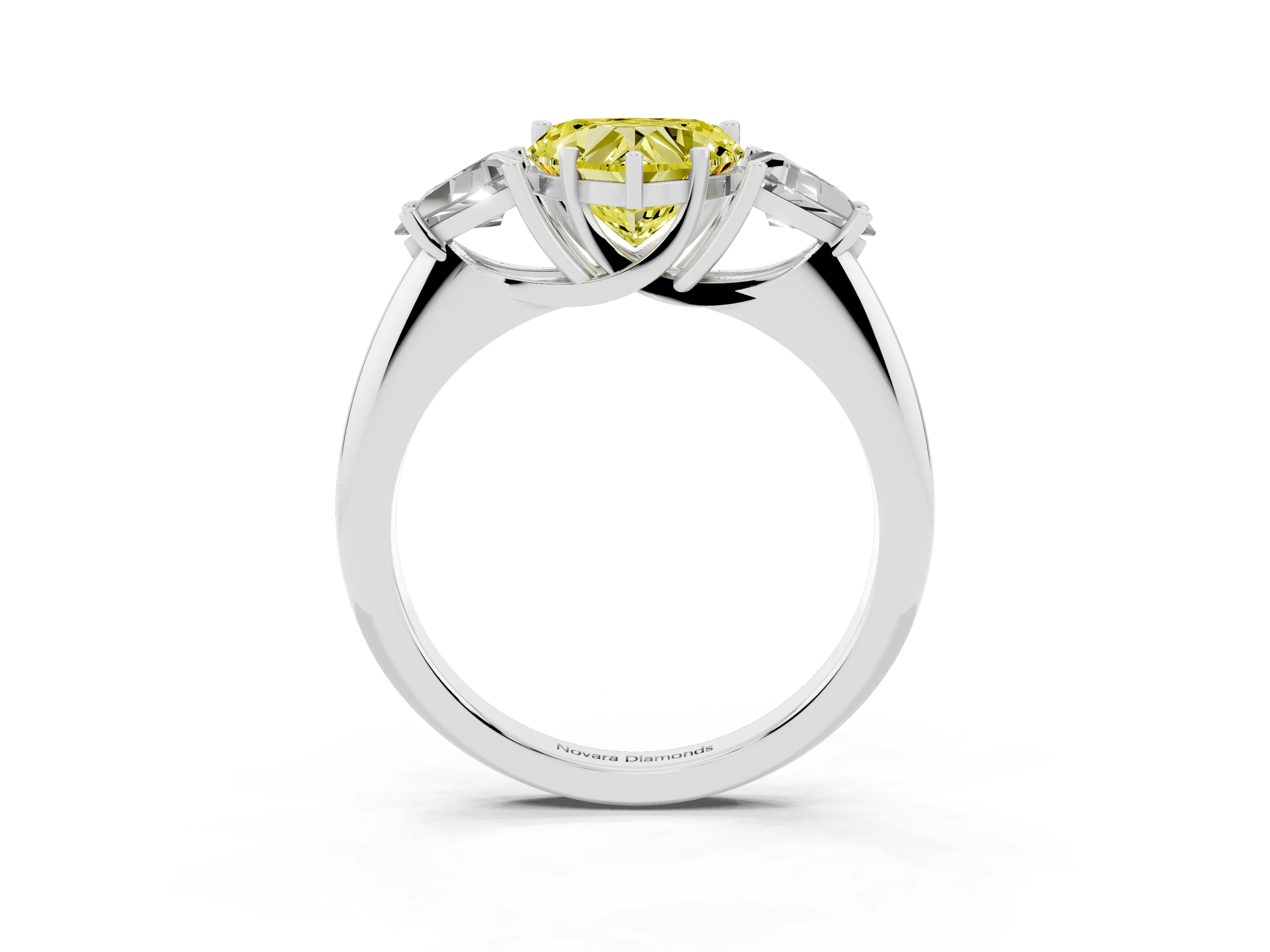 Fancy Yellow Heart Cut Diamond Three-Stone Engagement Ring Set in Platinum with Trillion Side Stones