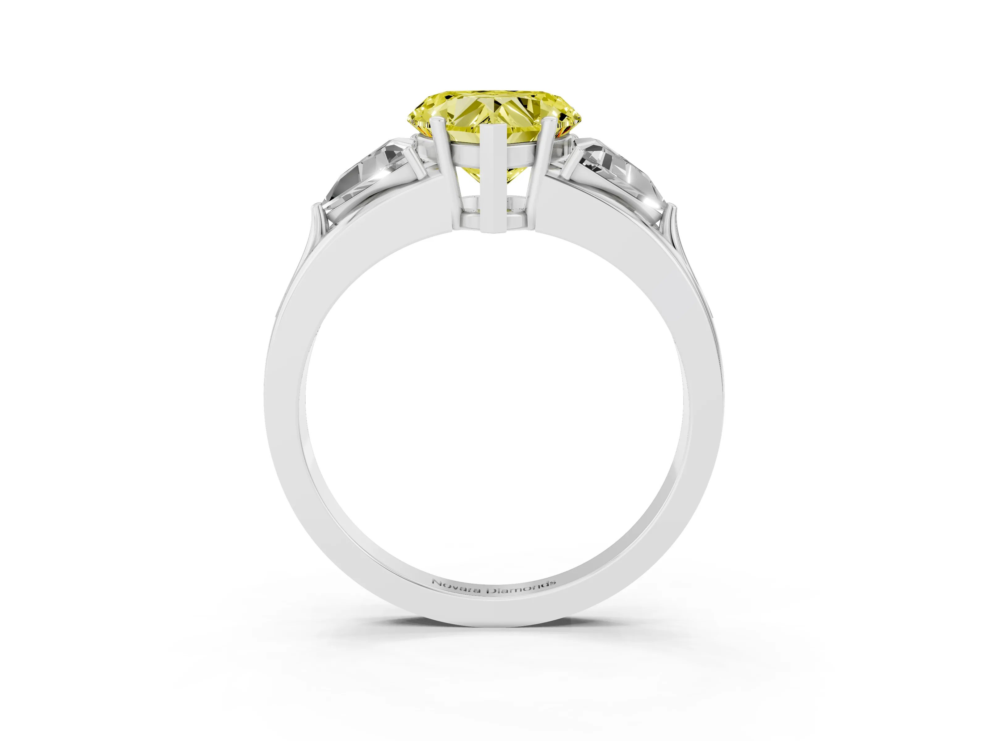 Fancy Yellow Heart Cut Diamond Three-Stone Ring Set in Platinum with Trillion Side Stones and Split Shank