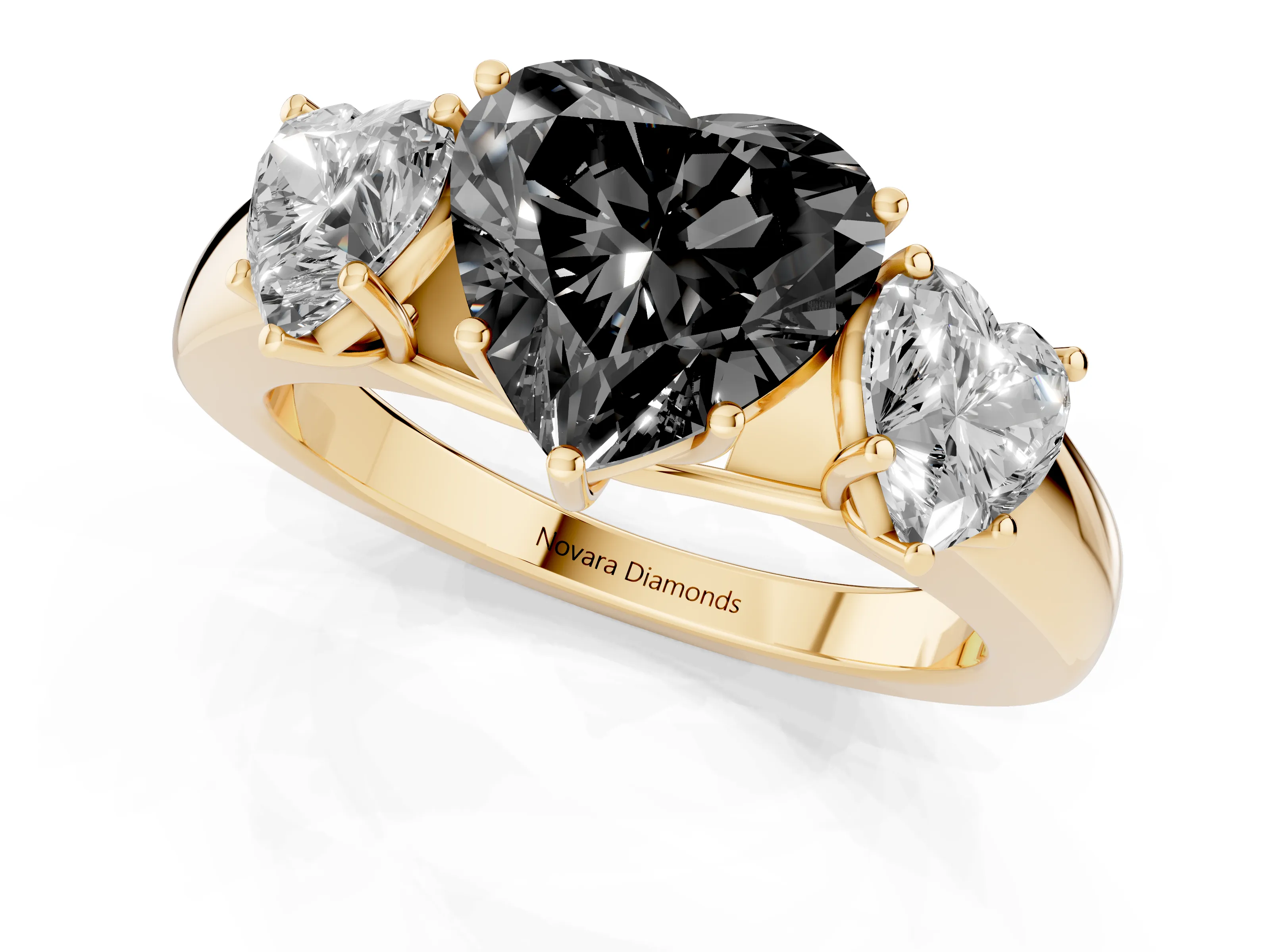 Fancy Black Three-Stone Heart Cut Diamond Ring Set in Yellow gold with Matching Prong Settings and Plain Band