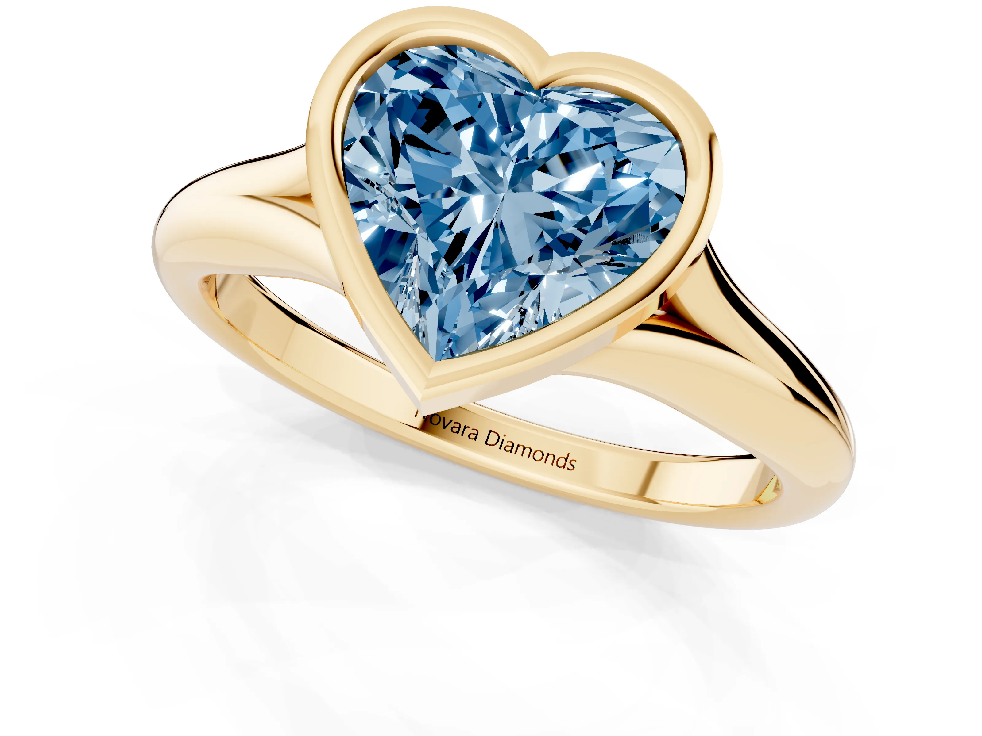 Fancy Blue Bezel Set Heart Cut Diamond Solitaire Ring Set in Yellow gold with Smooth Band