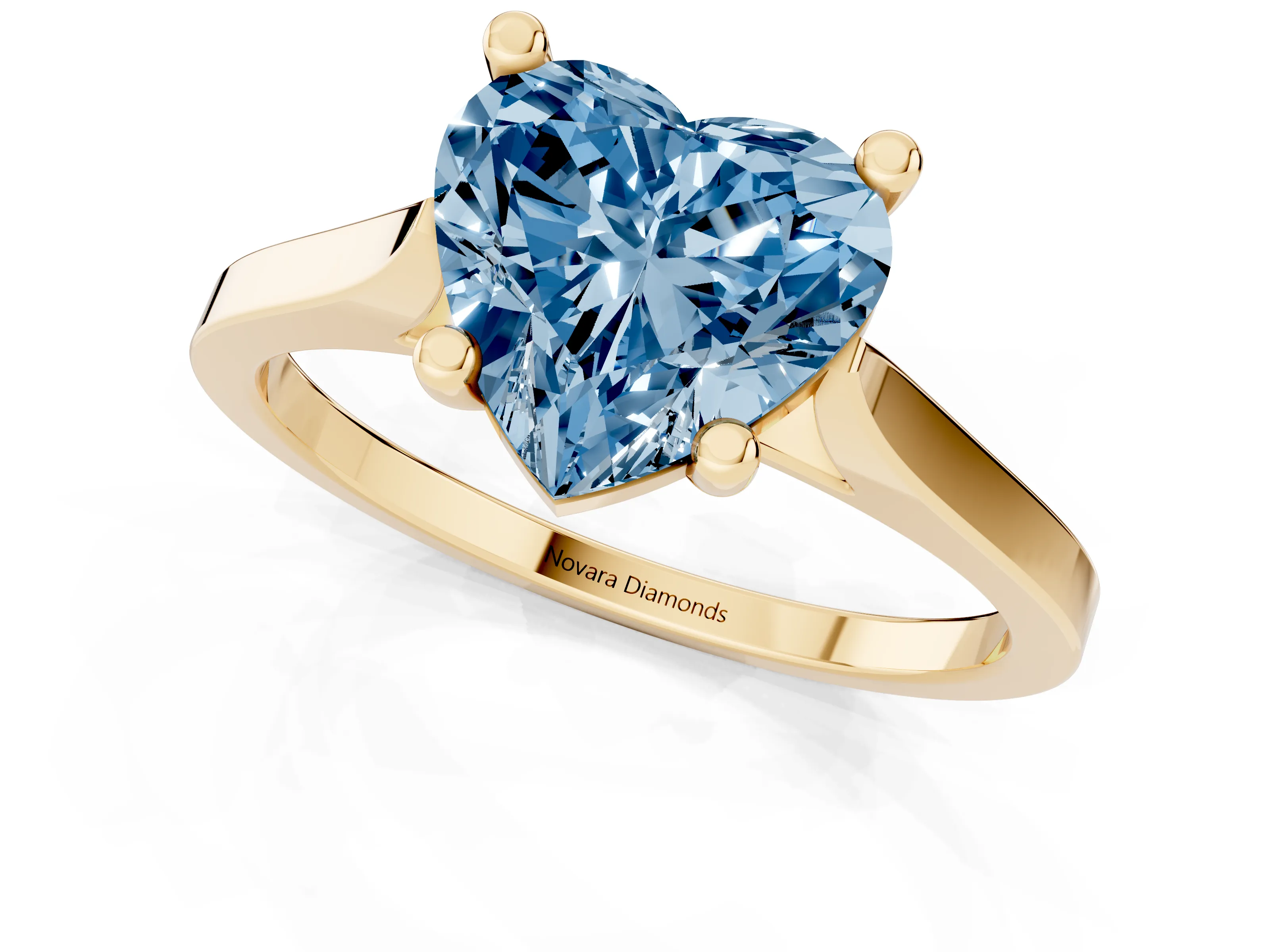 Fancy Blue Heart Cut Diamond Solitaire Ring Set in Yellow gold with Prong Setting and Tapered Band