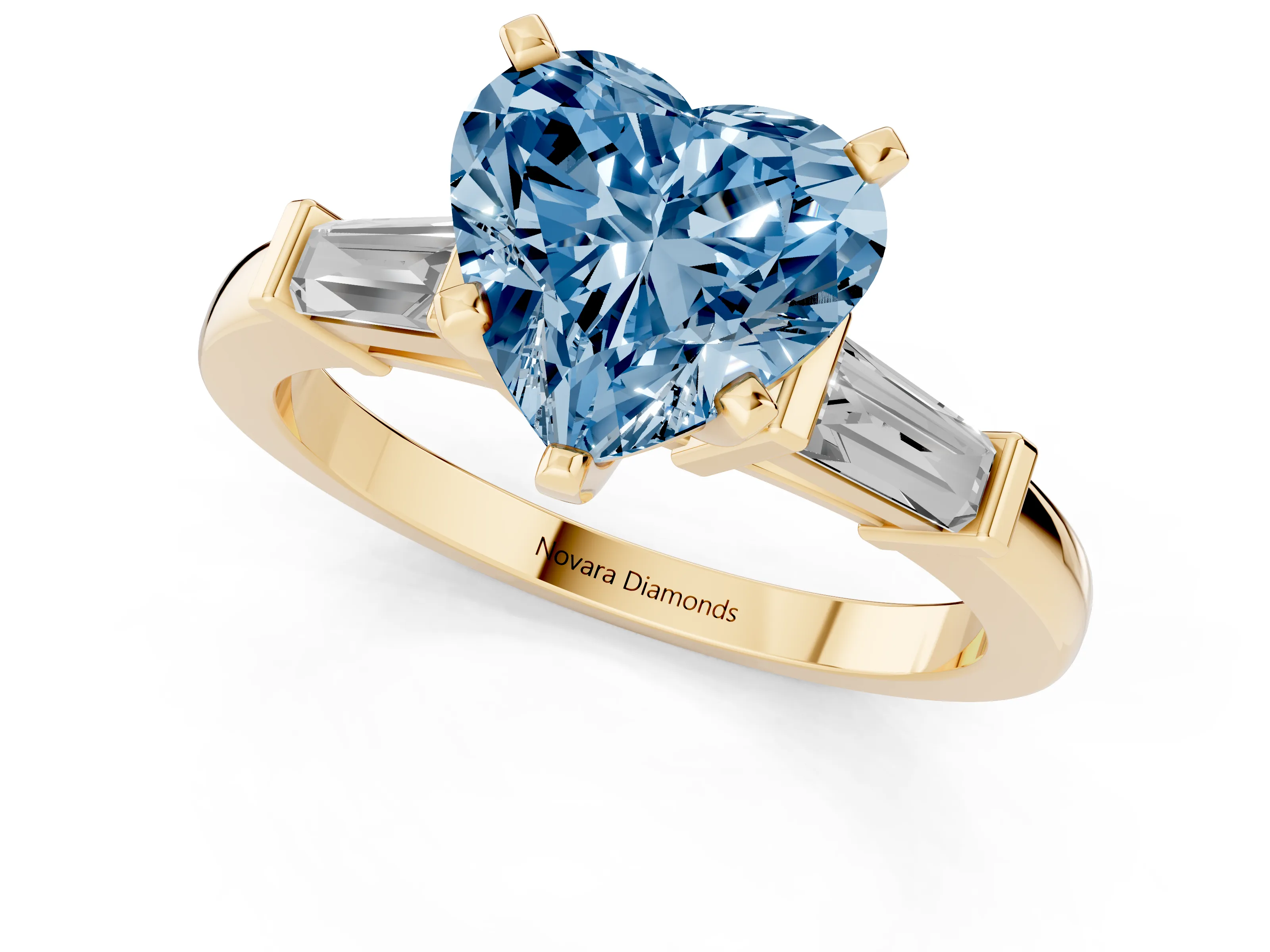 Fancy Blue Heart Cut Diamond Solitaire Ring Set in Yellow gold with Tapered Baguette Accents and Prong Setting