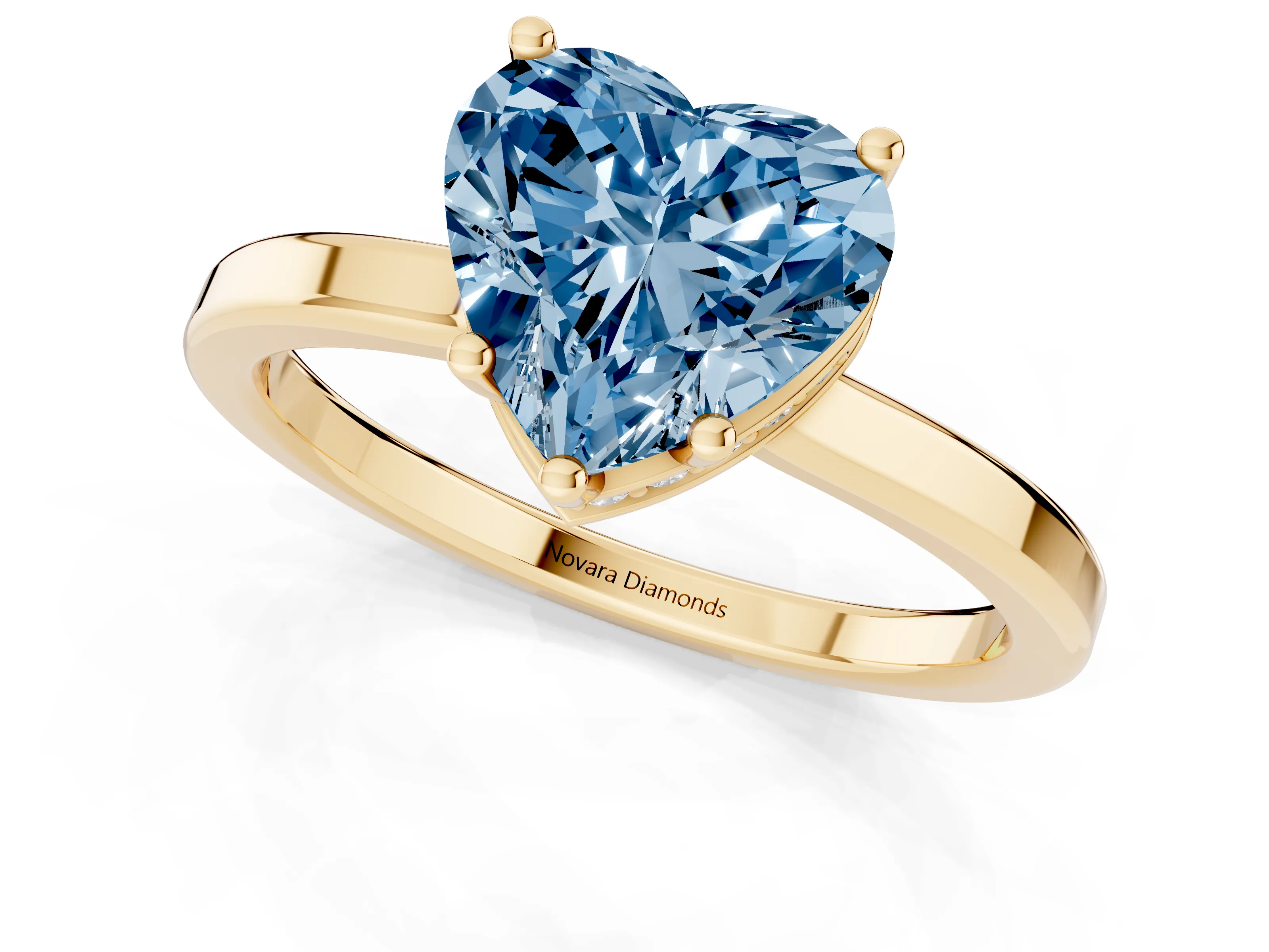 Fancy Blue Heart Cut Diamond Solitaire Engagement Ring Set in Yellow gold with Prong Setting on a Plain Band