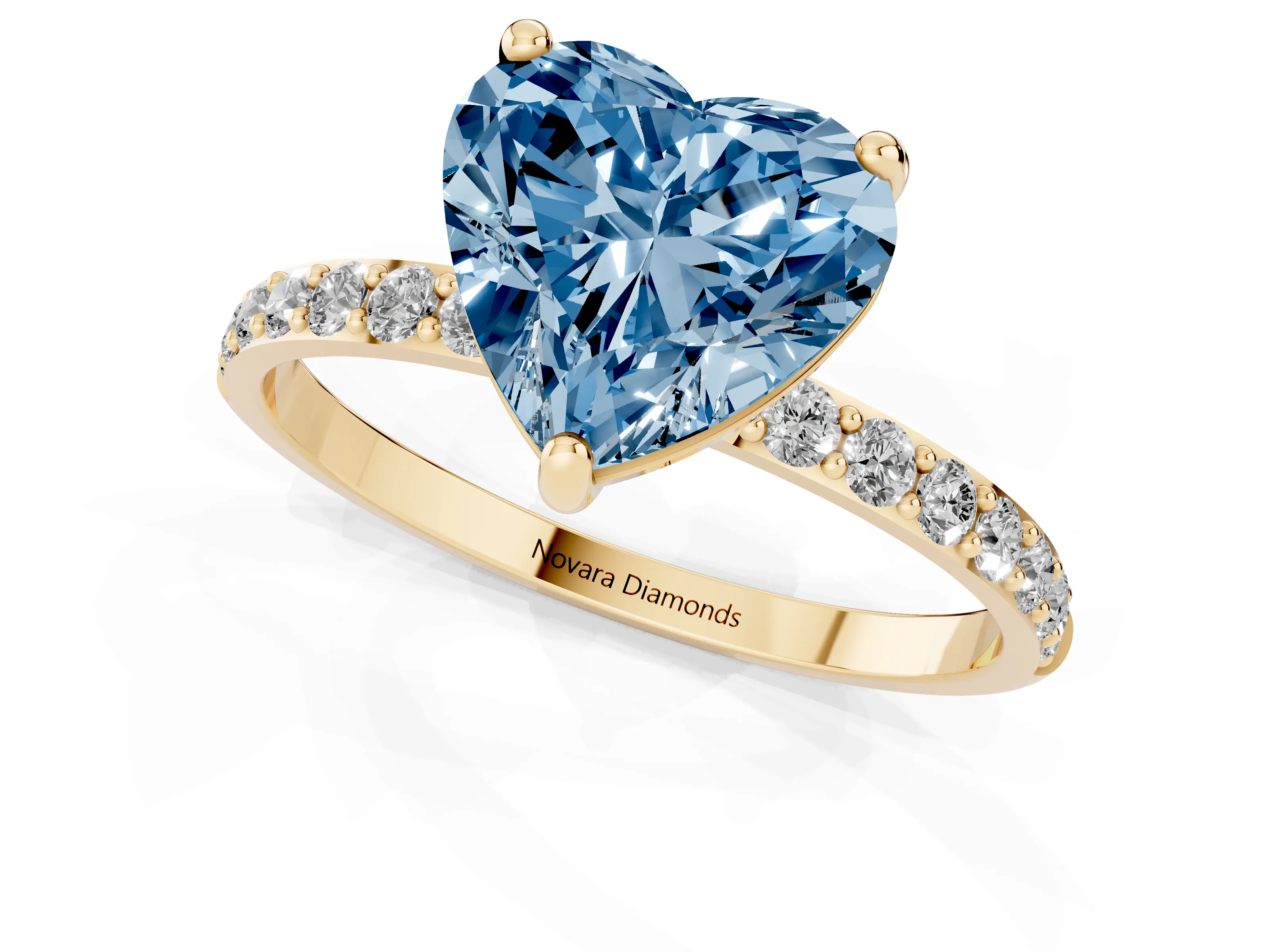 Fancy Blue Heart Cut Diamond Solitaire Ring Set in Yellow gold with Round Pavé Band and Prong Setting