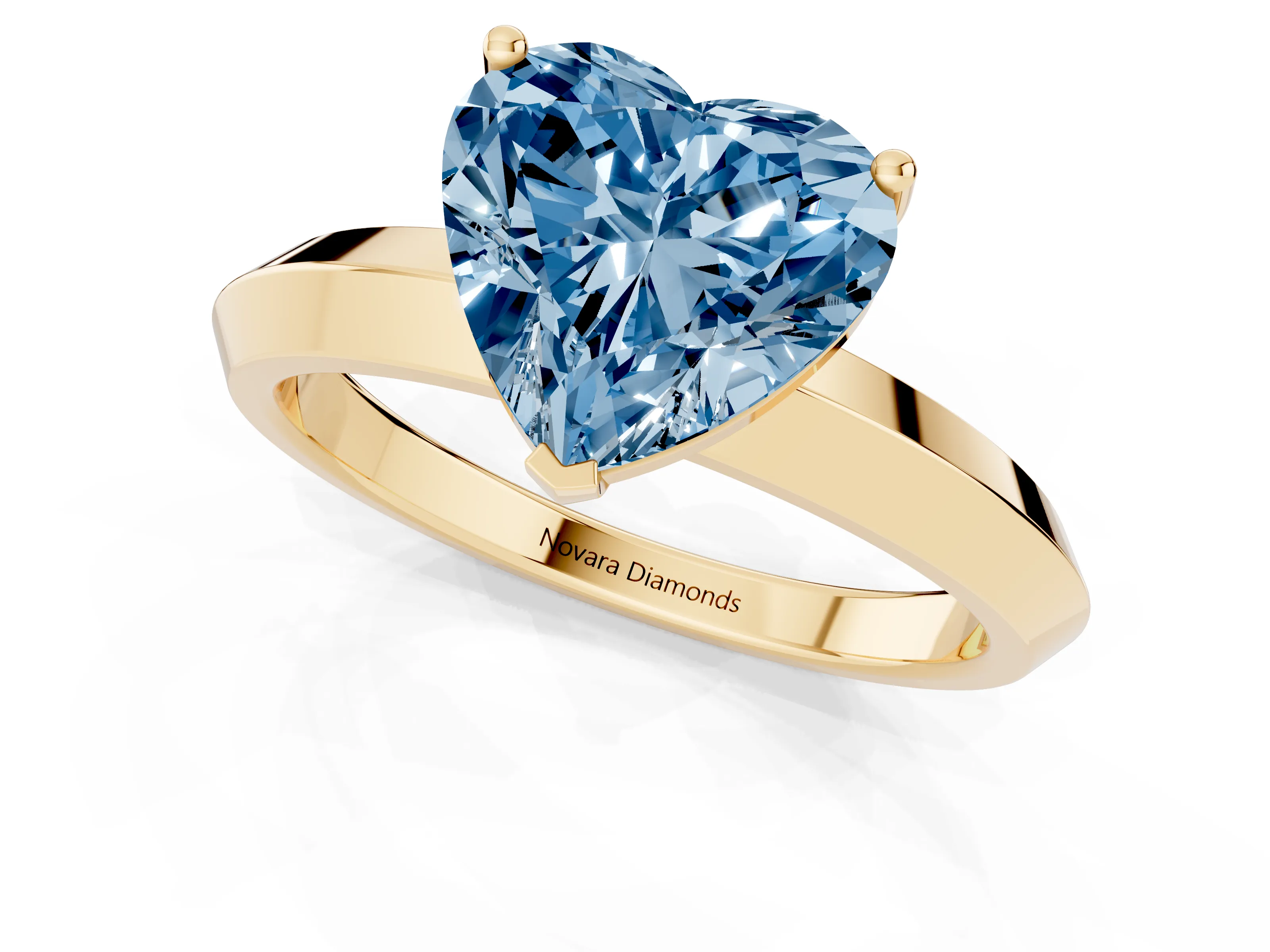 Fancy Blue Heart Cut Diamond Solitaire Engagement Ring Set in Yellow gold with Flat Band and Prong Setting