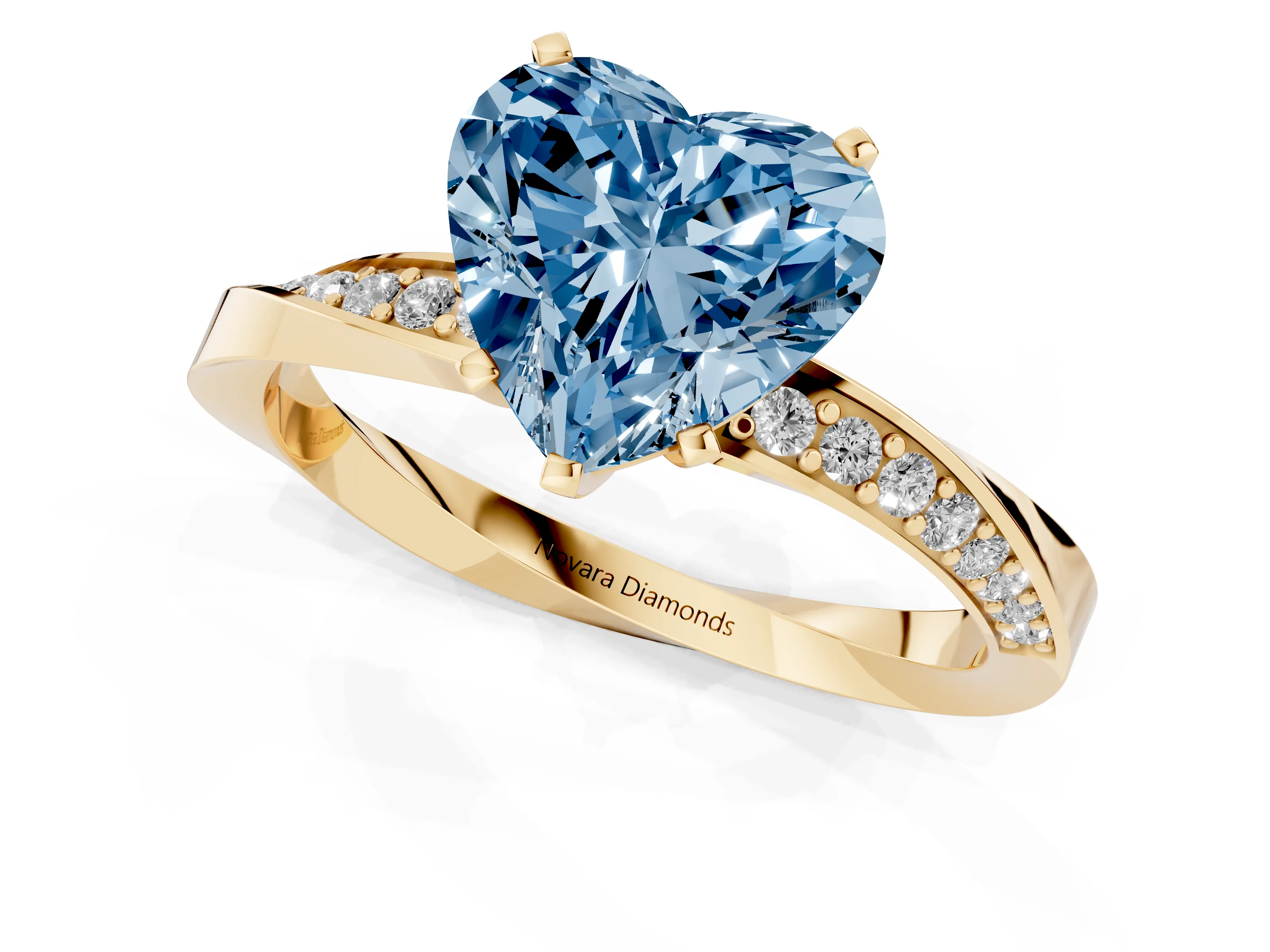 Fancy Blue Heart Cut Diamond Engagement Ring Set in Yellow gold with Side Stone Accents and Prong Setting