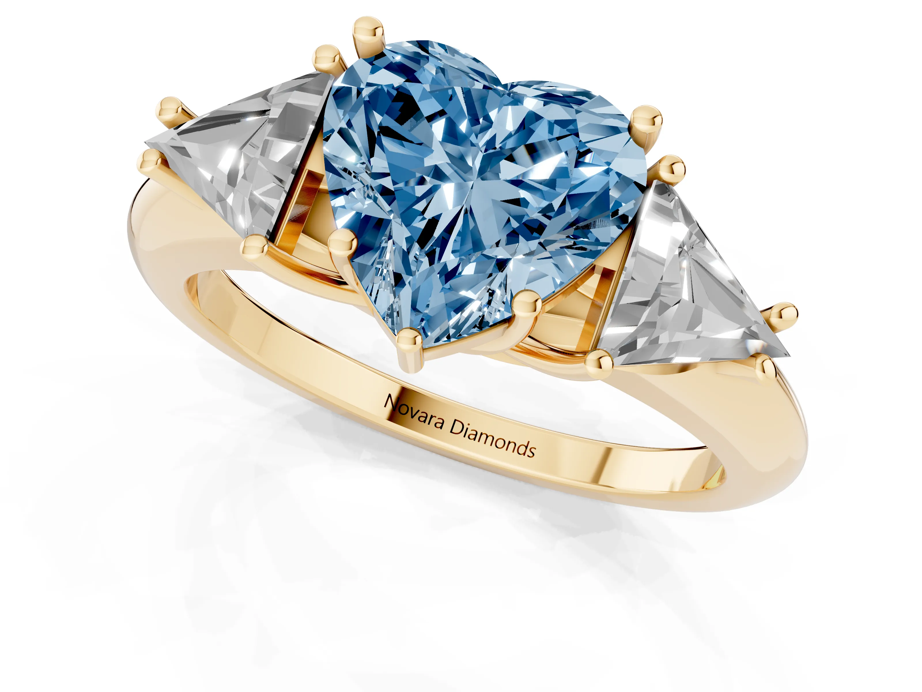 Fancy Blue Heart Cut Diamond Three-Stone Engagement Ring Set in Yellow gold with Trillion Side Stones