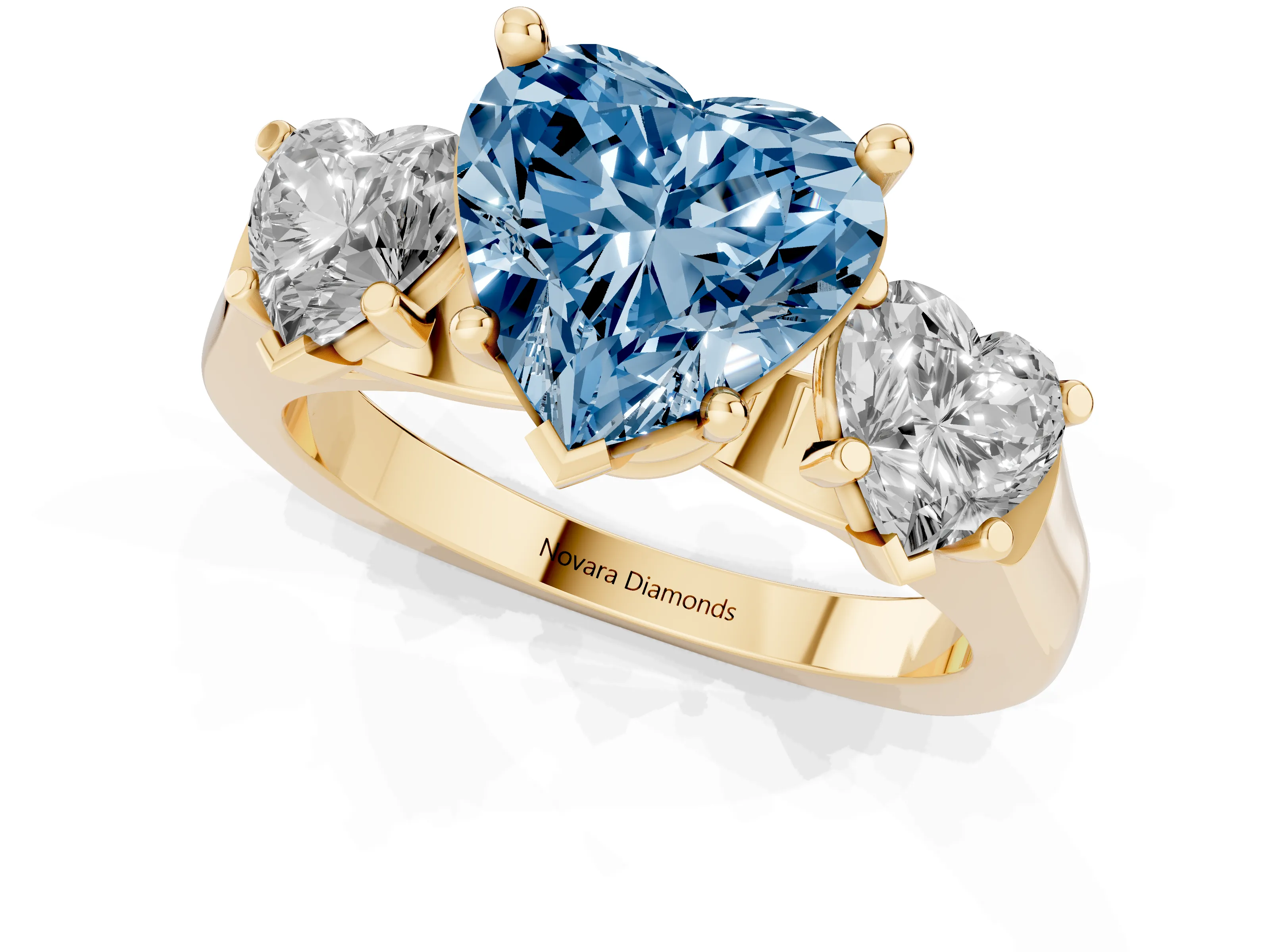 Fancy Blue Heart Cut Diamond Three-Stone Trellis Ring Set in Yellow gold with Comfort Fit Band