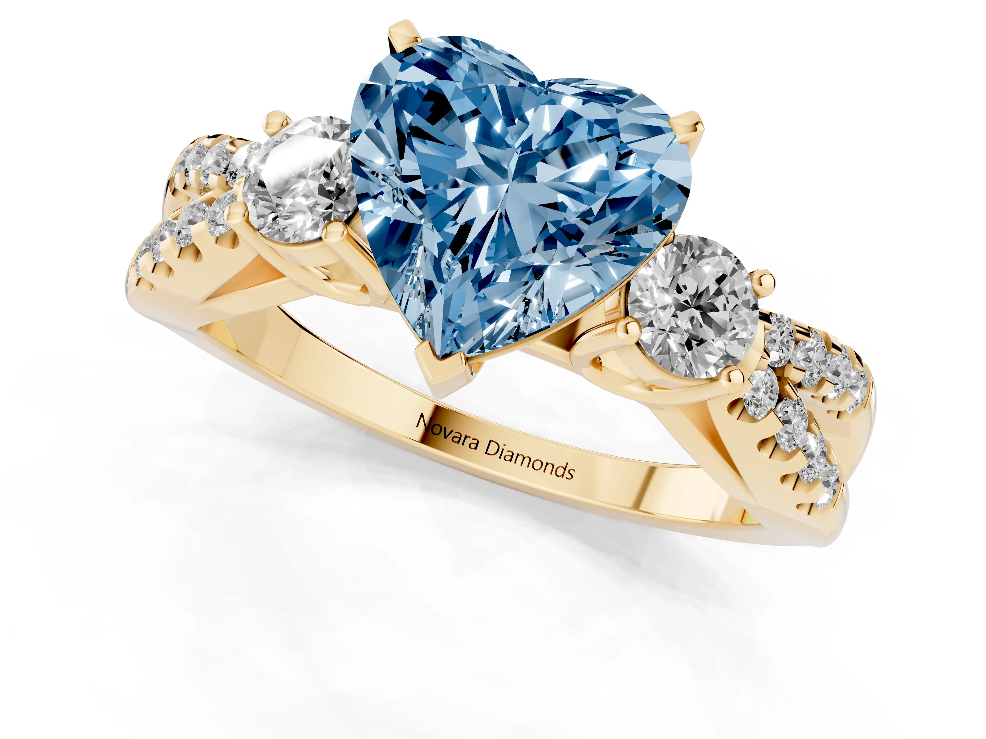 Fancy Blue Heart Cut Diamond Three-Stone Ring Set in Yellow gold with Pavé Split Shank and Prong Setting