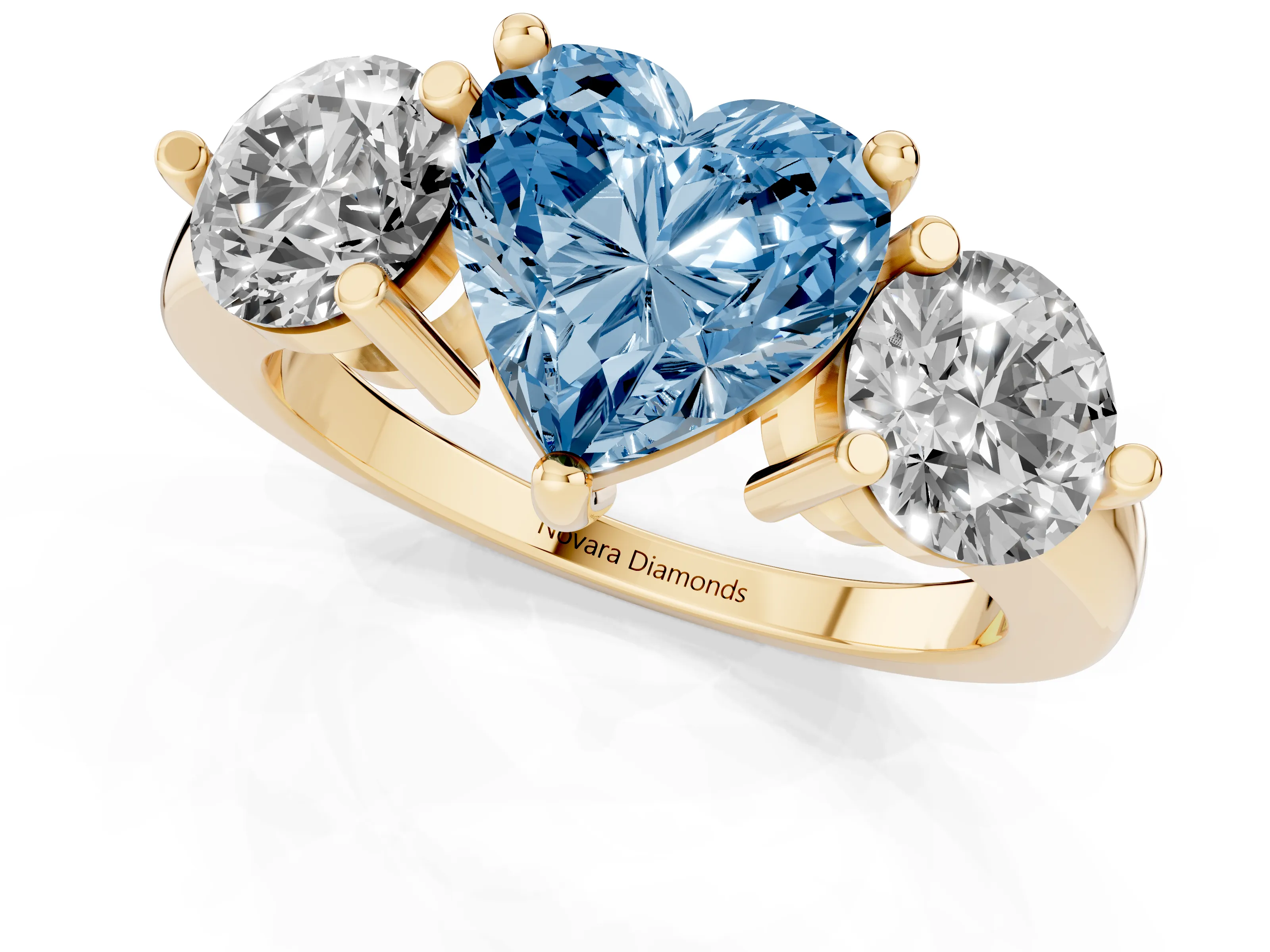 Fancy Blue Heart Cut Diamond Three-Stone Ring Set in Yellow gold with Prong Setting and Classic Band