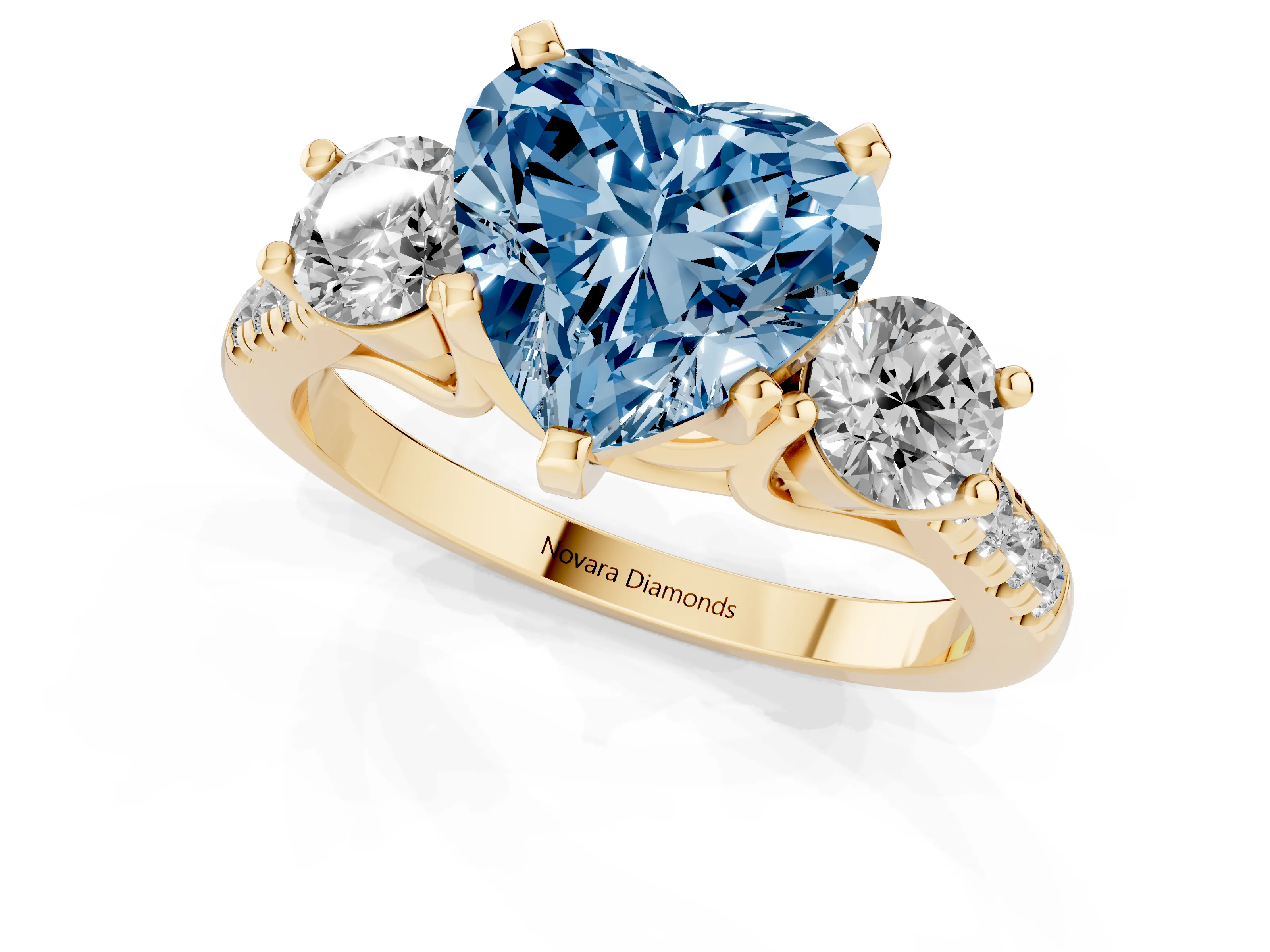 Fancy Blue Three-Stone Heart Cut Diamond Pavé Band Ring Set in Yellow gold with Prong-Set Trio