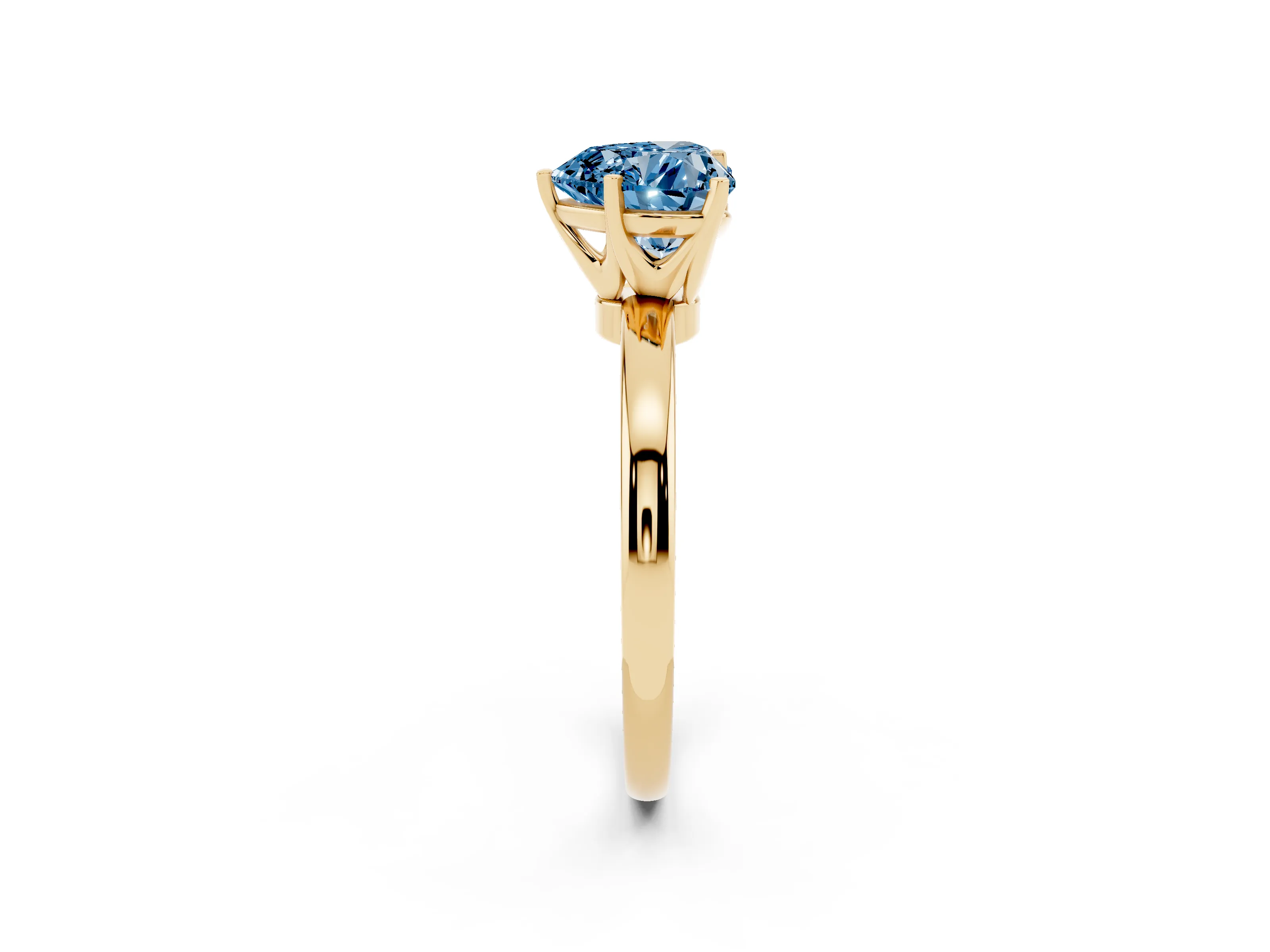 Fancy Blue Heart Cut Diamond Solitaire Ring Set in Yellow gold with Raised Prong Setting on a Classic Band