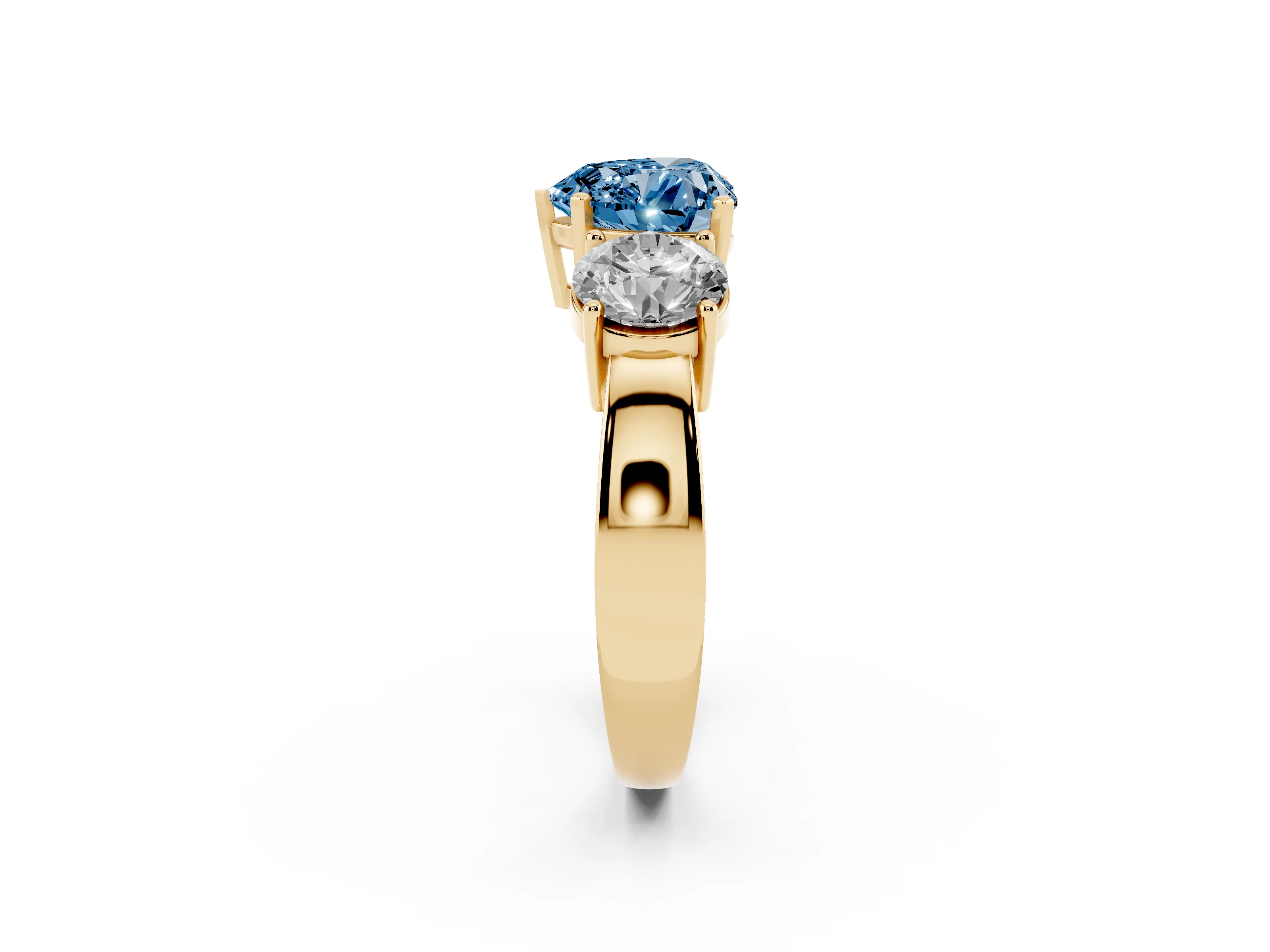 Fancy Blue Heart Cut Diamond Three-Stone Ring Set in Yellow gold with Round Side Stones and Classic Band